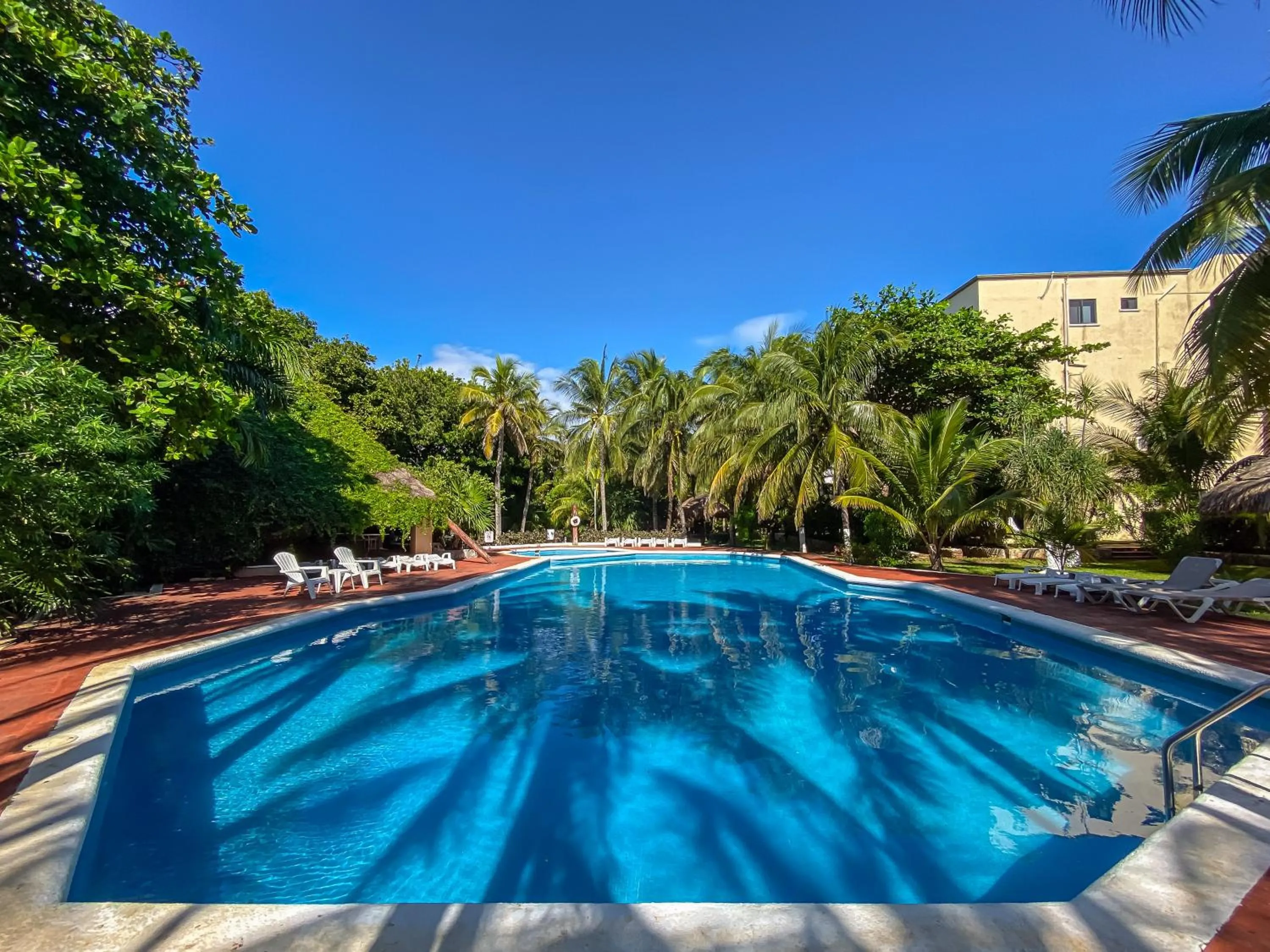 Swimming pool in Villas Tropical By Andiani