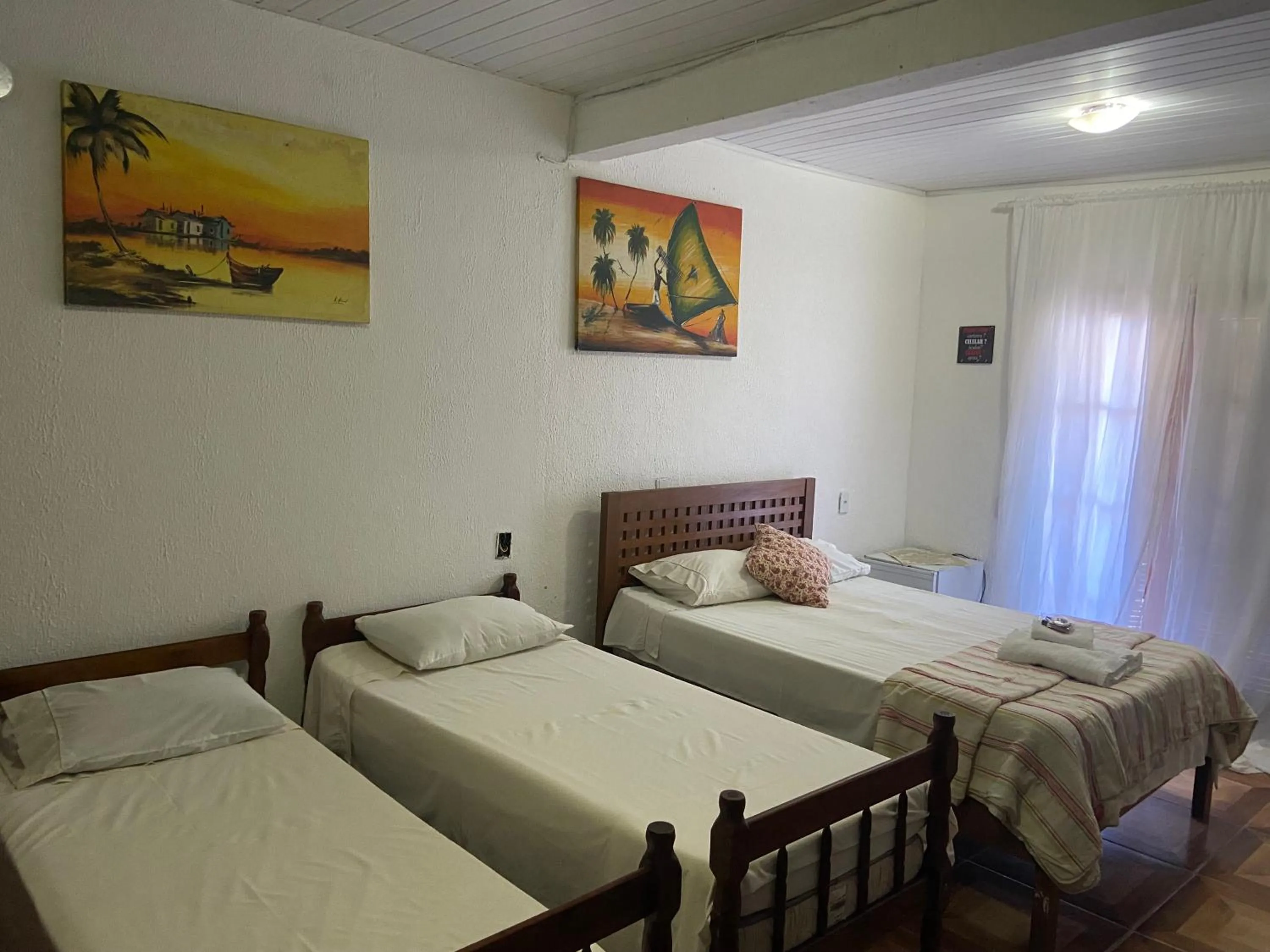 Photo of the whole room, Bed in Pousada Maresias de Geribá