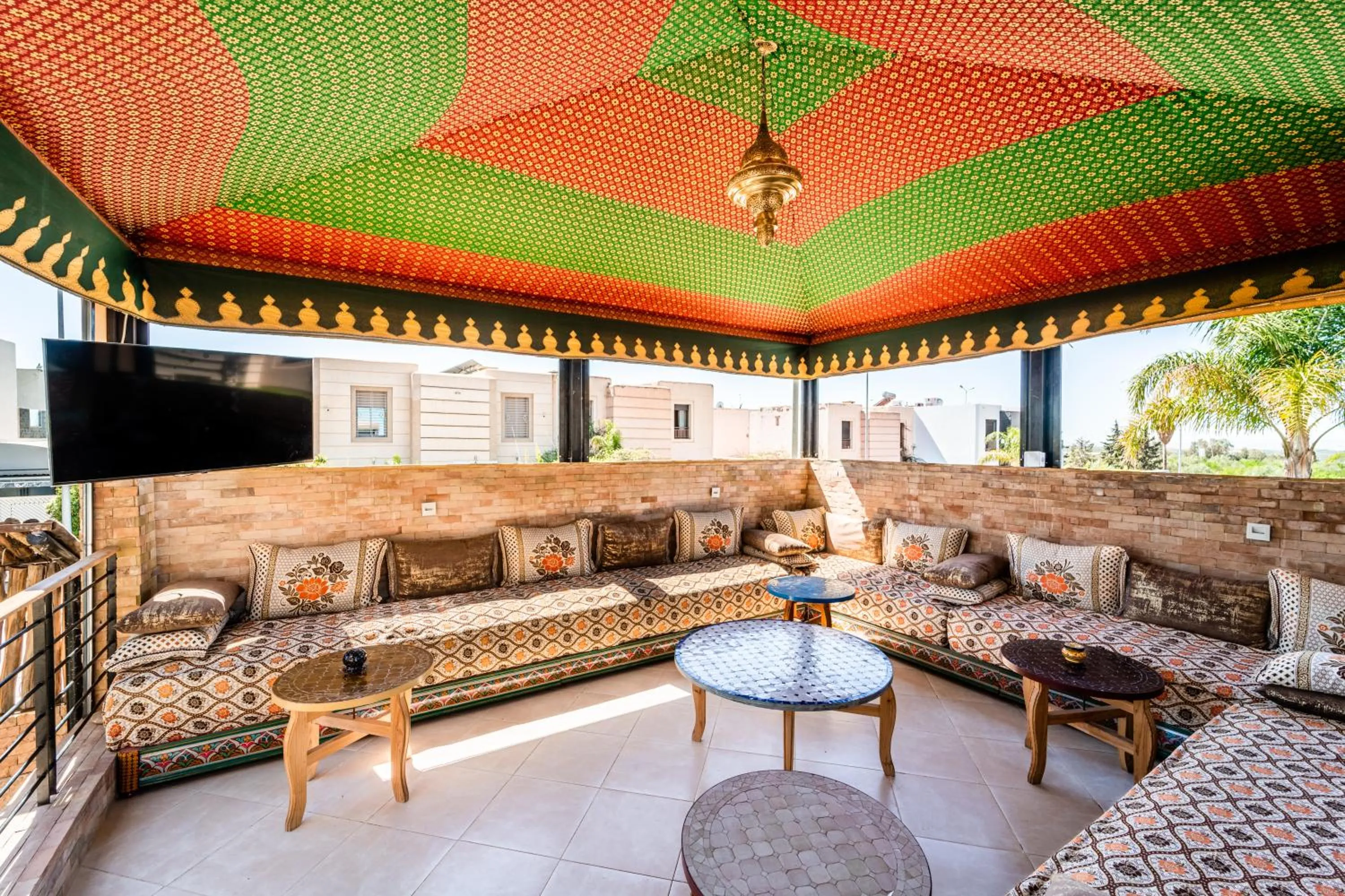 Communal lounge/ TV room in Riad Les Nuits De Fès