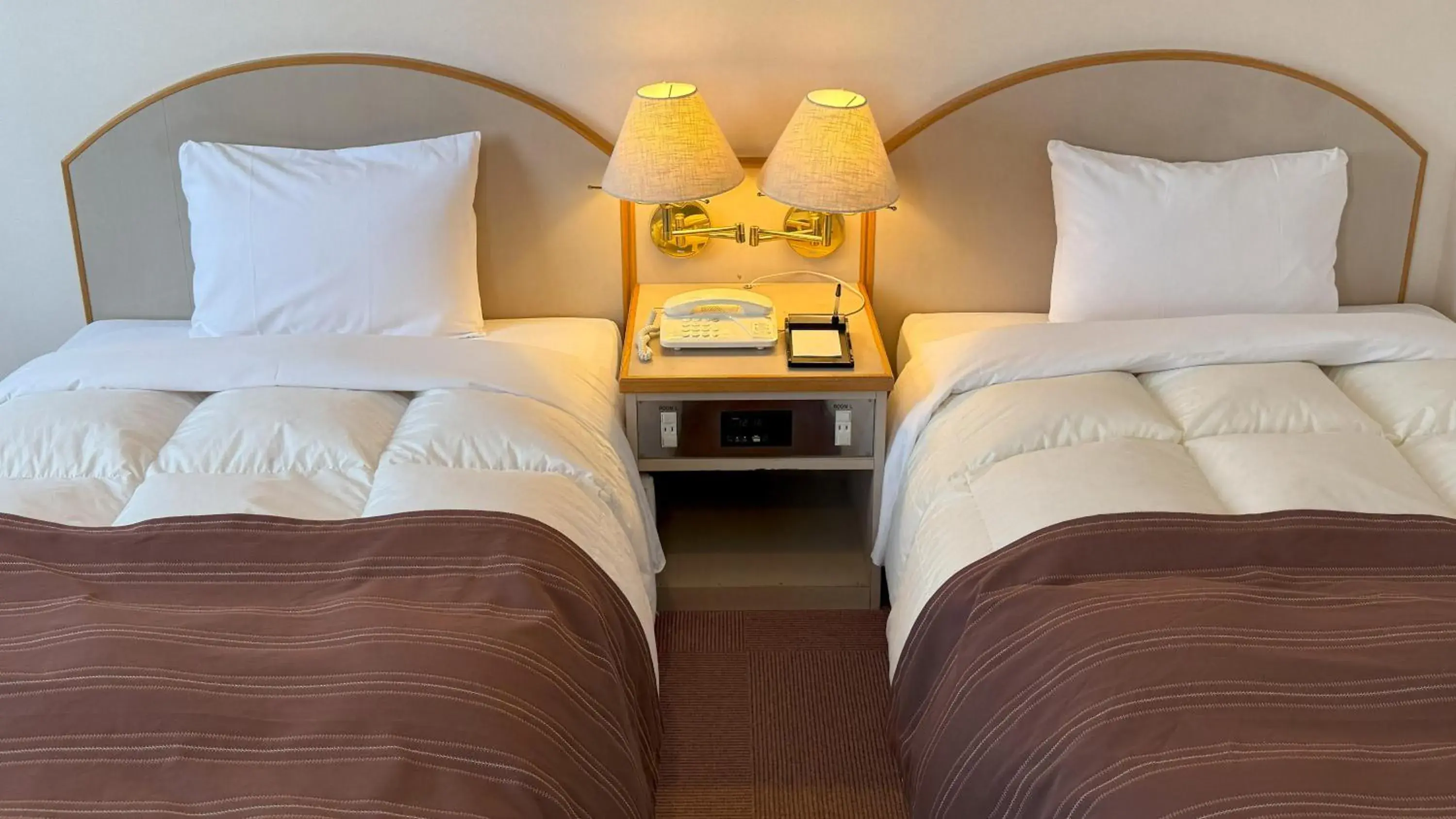 Bed in Hotel Sato Bed in Hotel Sato