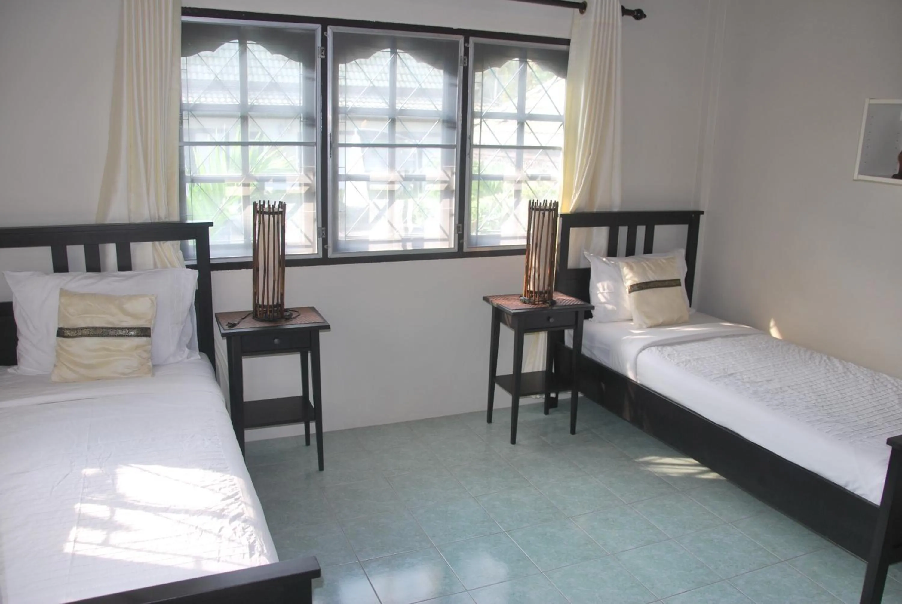 Bed in Baan Sawainam