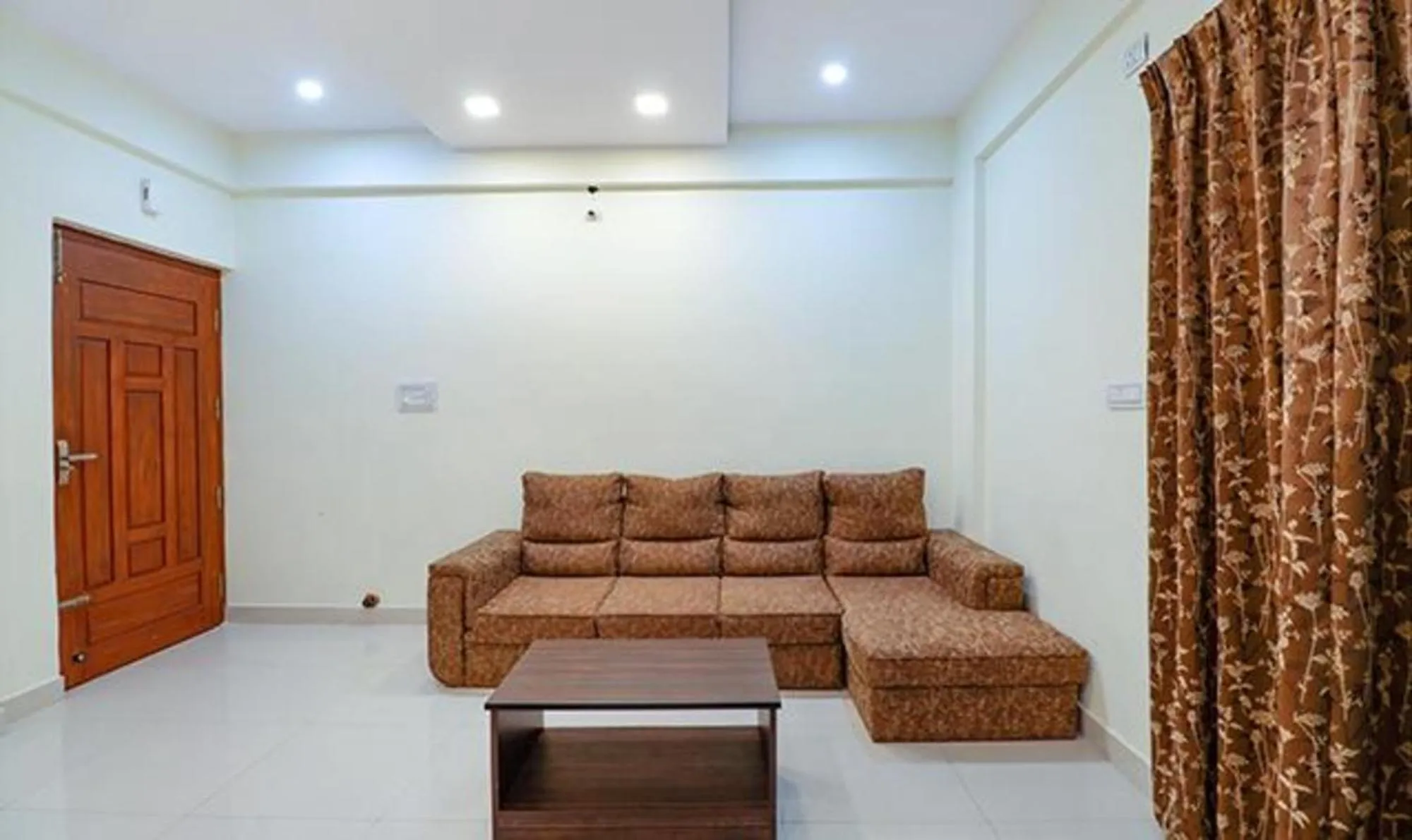 Seating area in Via Kings Suites