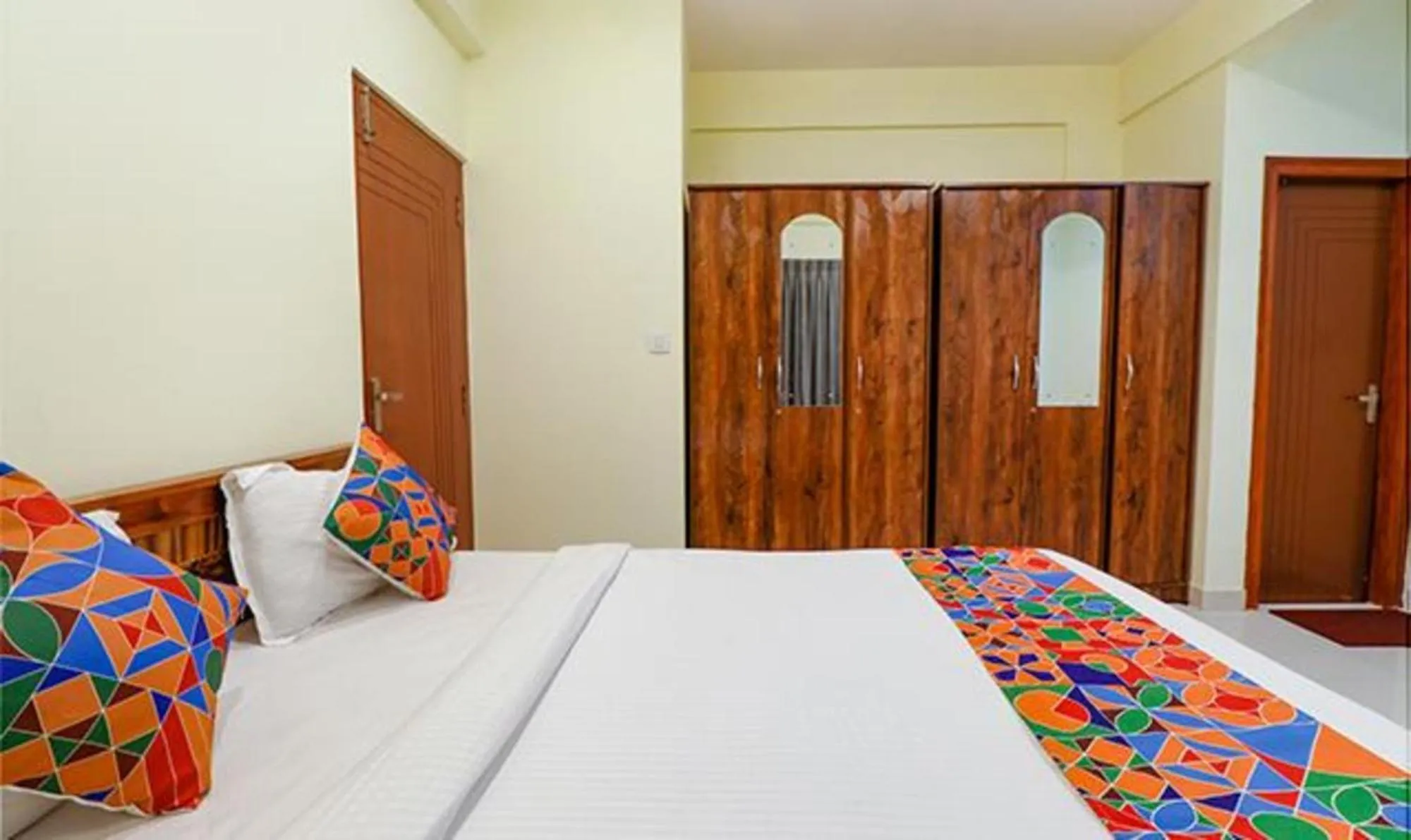 Bed in Via Kings Suites