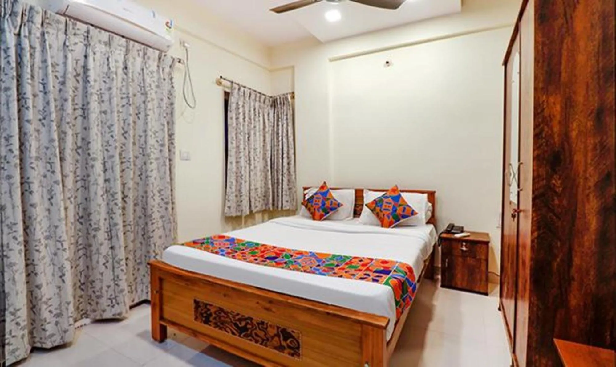 Bed in Via Kings Suites