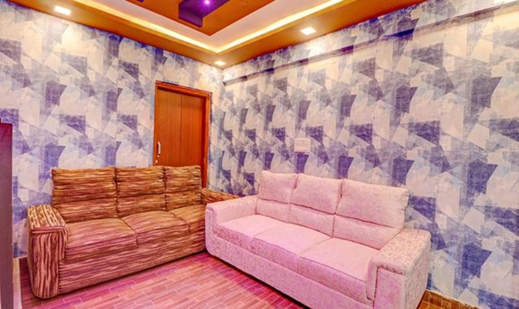 Seating area in Via Kings Suites