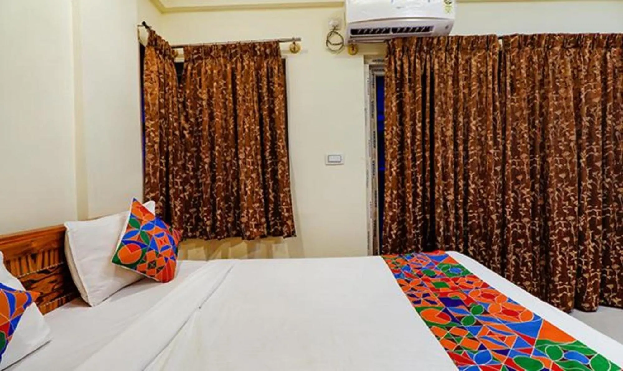 Bed in Via Kings Suites