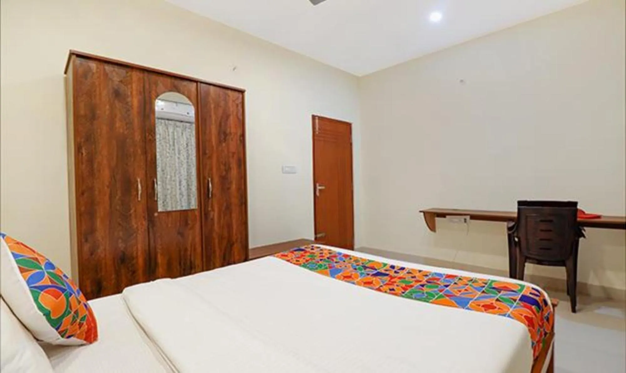 Bed in Via Kings Suites