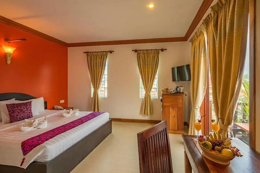 Photo of the whole room, Bed in Angkor Leap Hotel