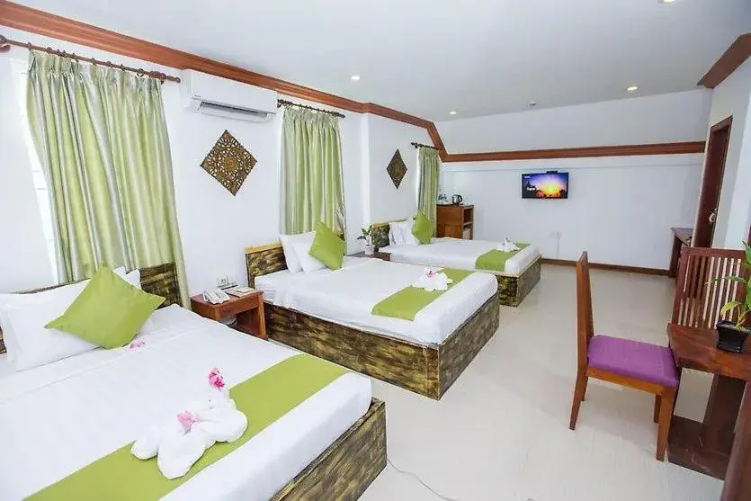 Bed in Angkor Leap Hotel Bed in Angkor Leap Hotel