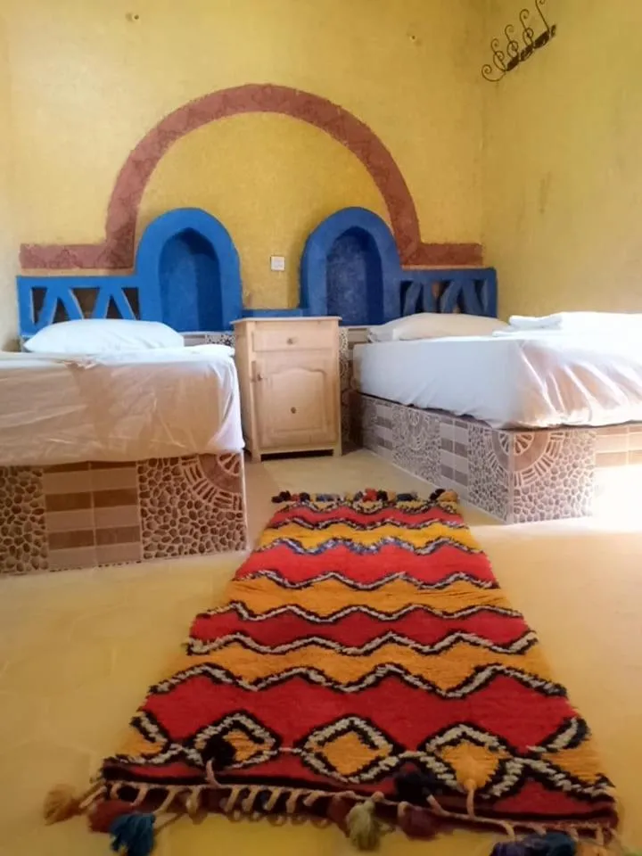 Bed in Les Pyramides Hotel Merzouga