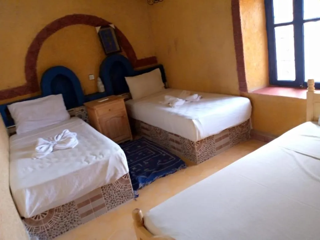 Bed in Les Pyramides Hotel Merzouga