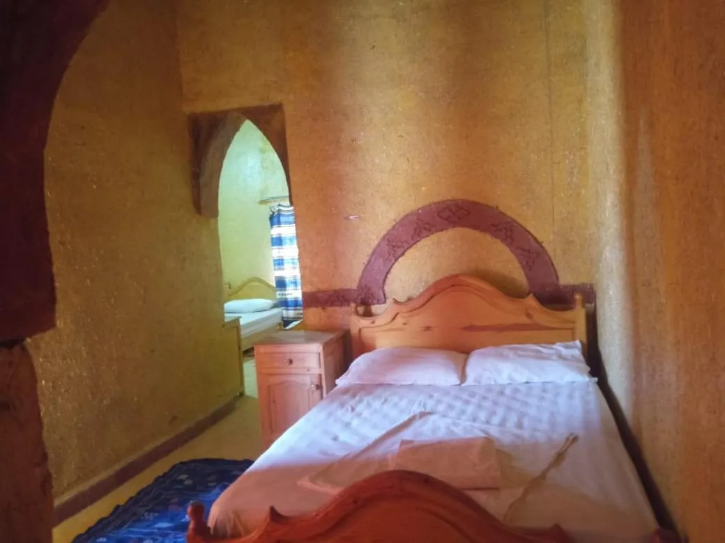 Bed in Les Pyramides Hotel Merzouga
