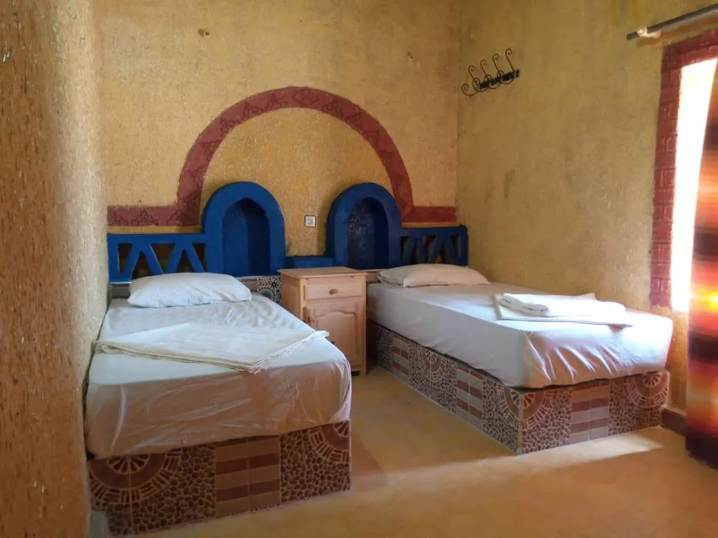 Bed in Les Pyramides Hotel Merzouga