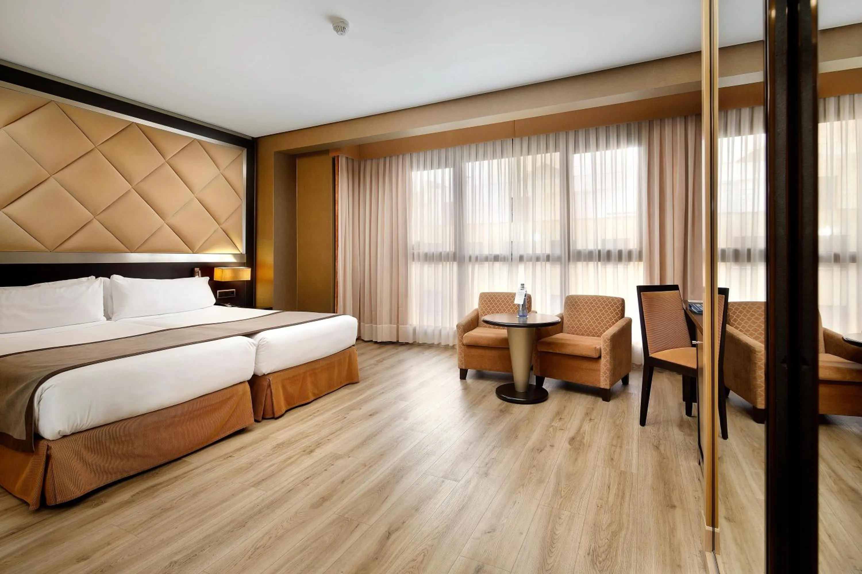 Photo of the whole room, Bed in HCC St. Moritz