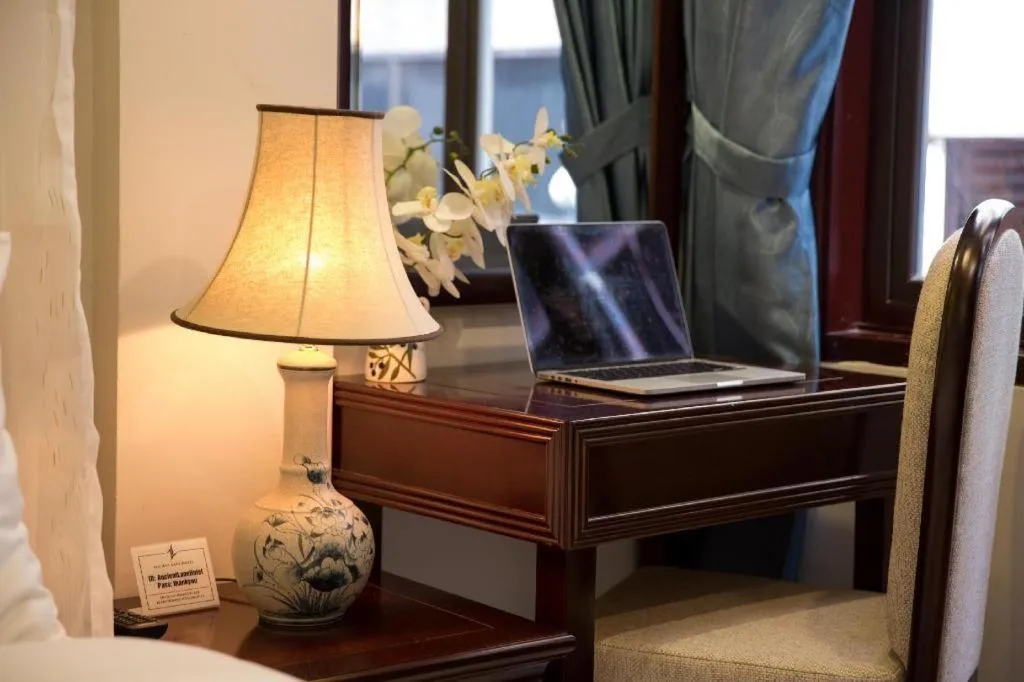 Seating area, Bed in Ancient Lane Hotel