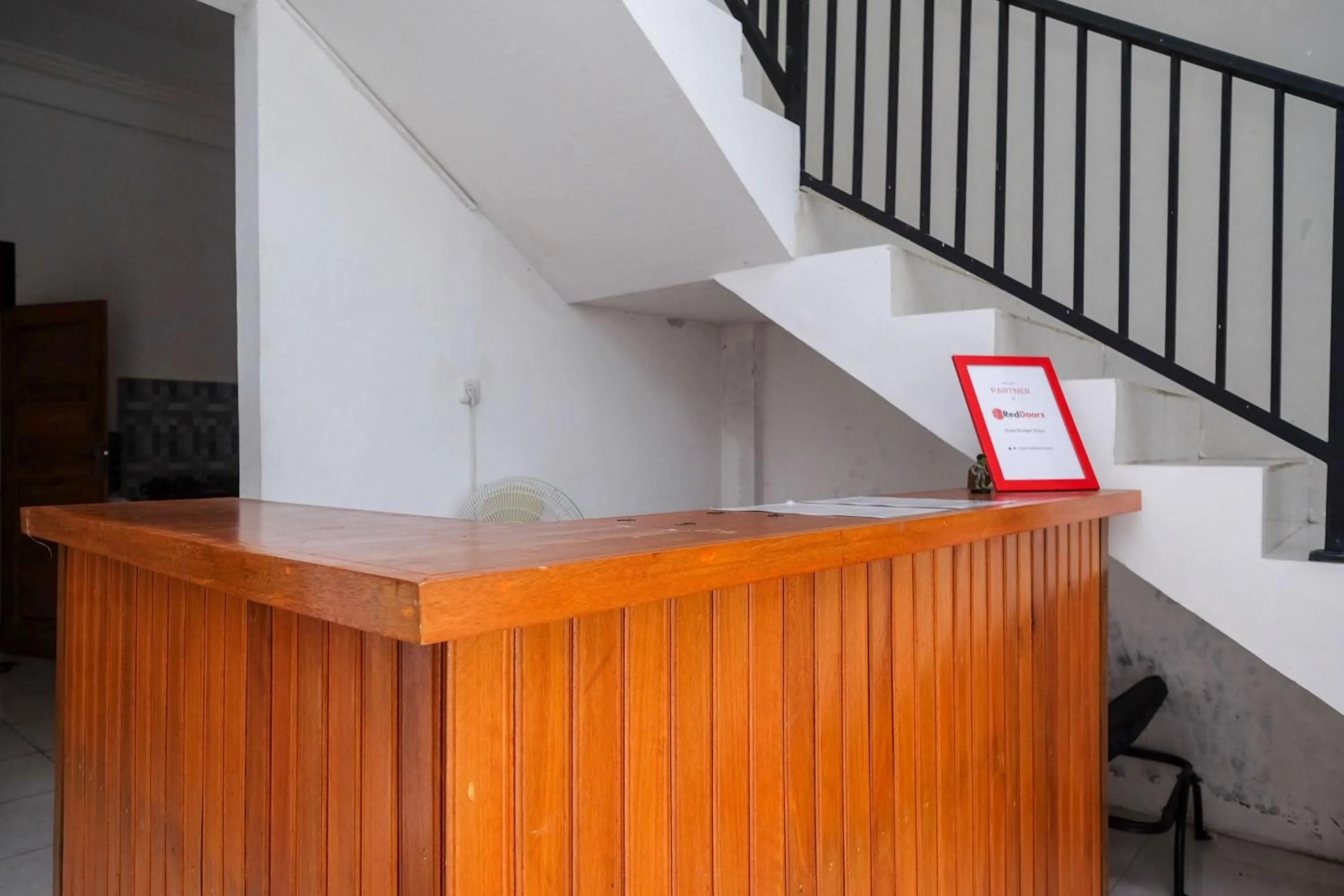 Lobby or reception in RedDoorz near De La Salle Manado