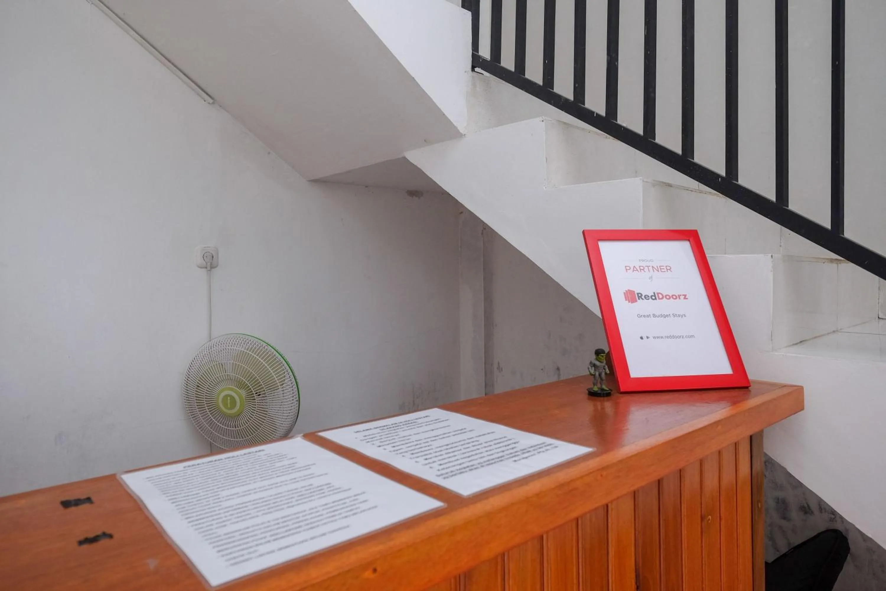 Lobby or reception in RedDoorz near De La Salle Manado