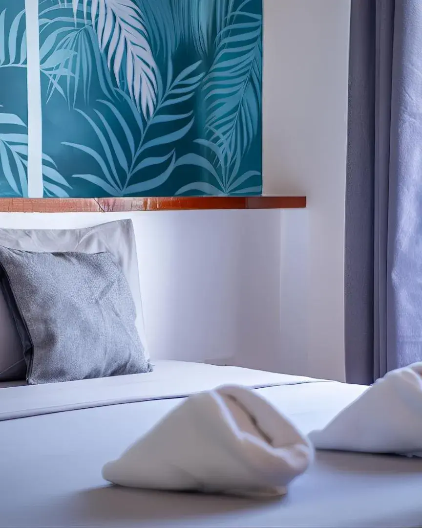 Bed in Yellow Mango Resort Bohol Bed in Yellow Mango Resort Bohol