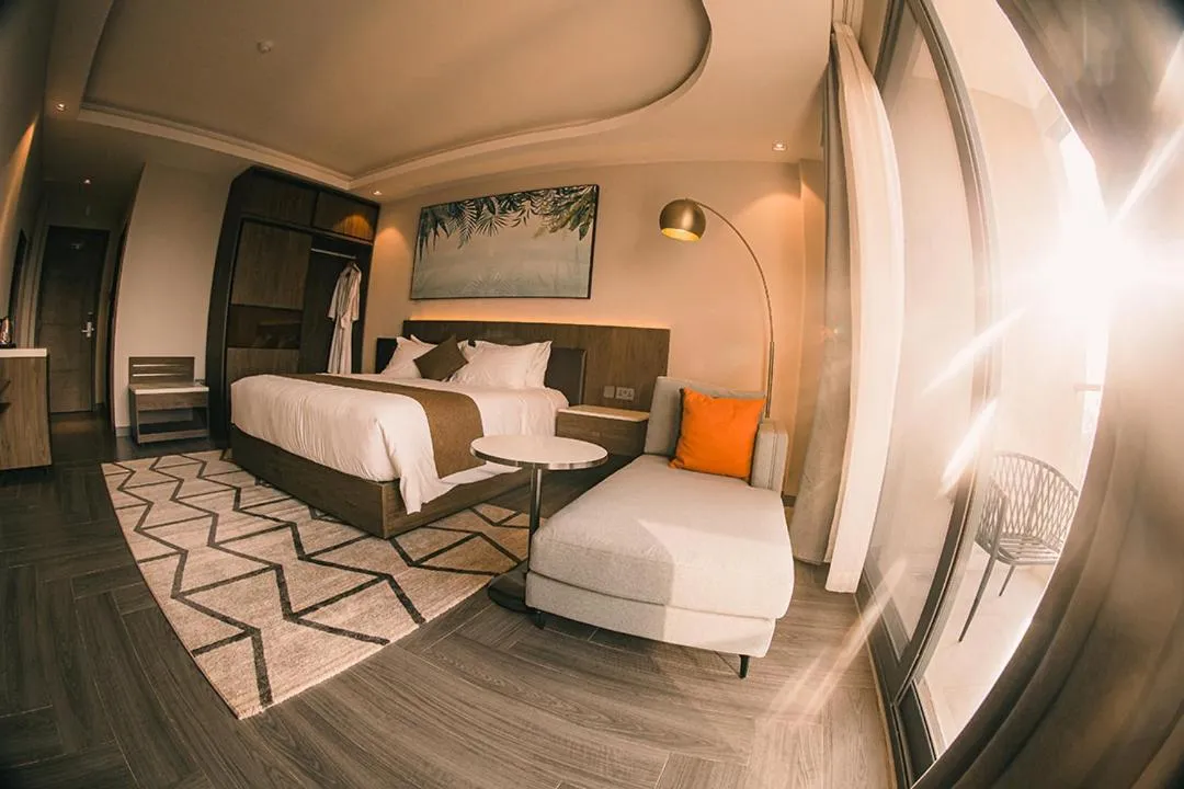 Bed in Zara Garden Hotel and Apartments