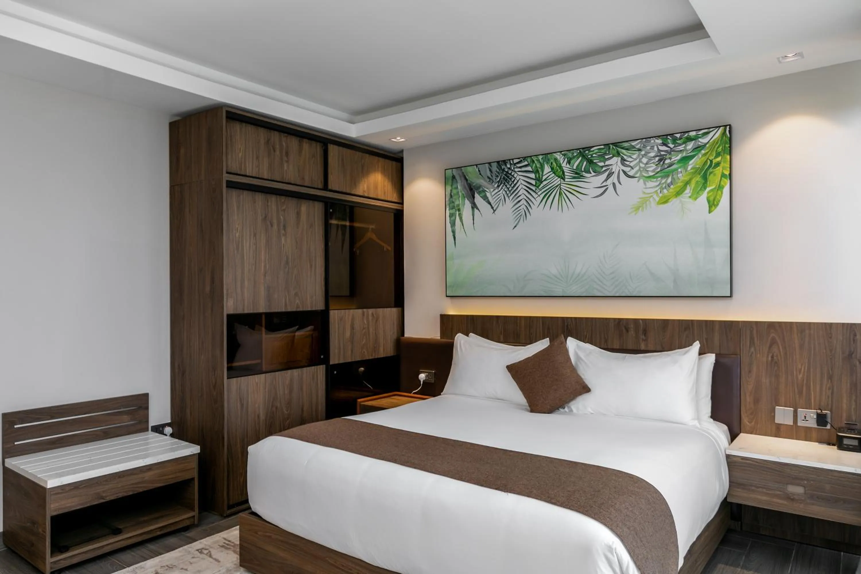 Bed in Zara Garden Hotel and Apartments