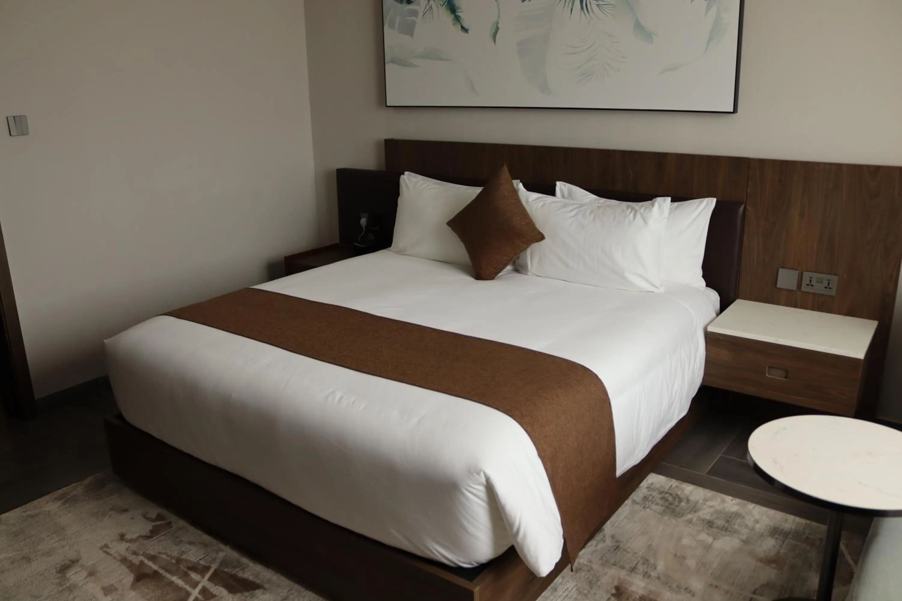 Bed in Zara Garden Hotel and Apartments