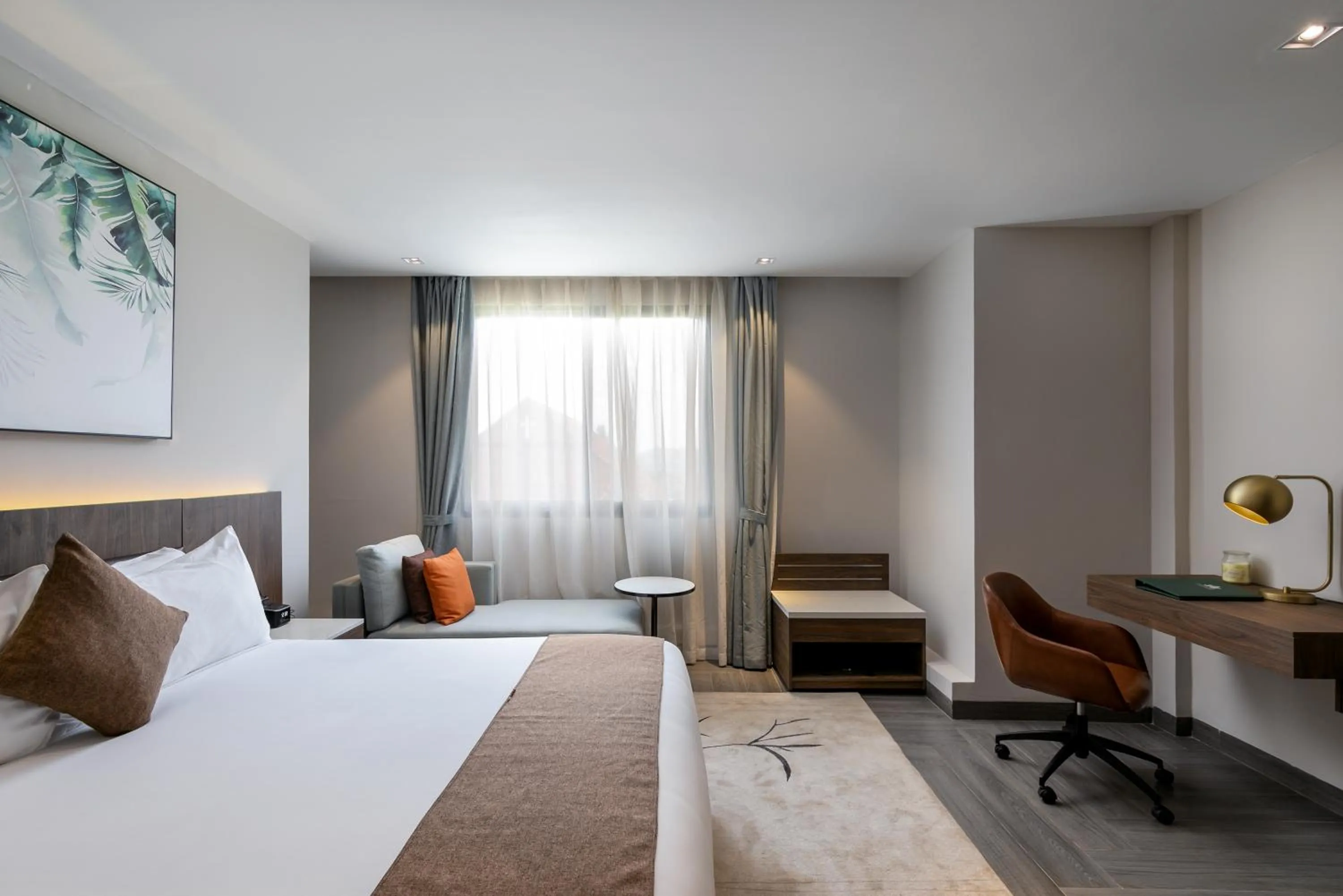 Bed in Zara Garden Hotel and Apartments