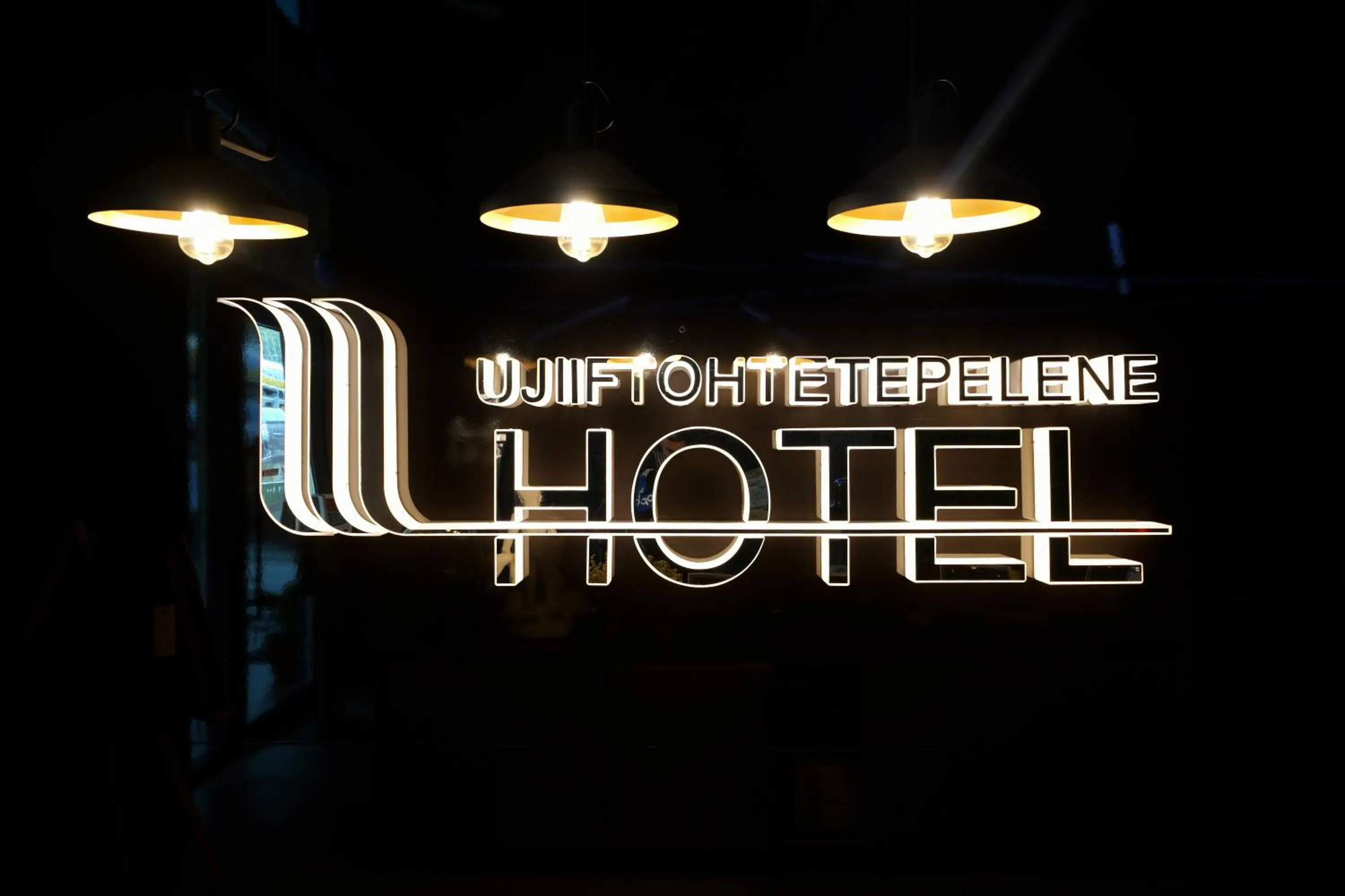 Property logo or sign in Hotel Uji Ftohte Tepelene