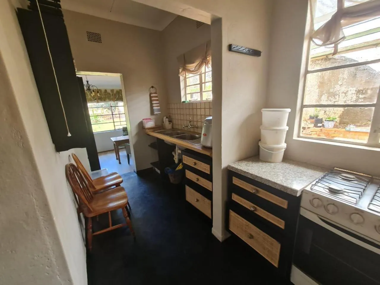 Kitchen or kitchenette, Bed in A Bird Cage Stay & Cottage