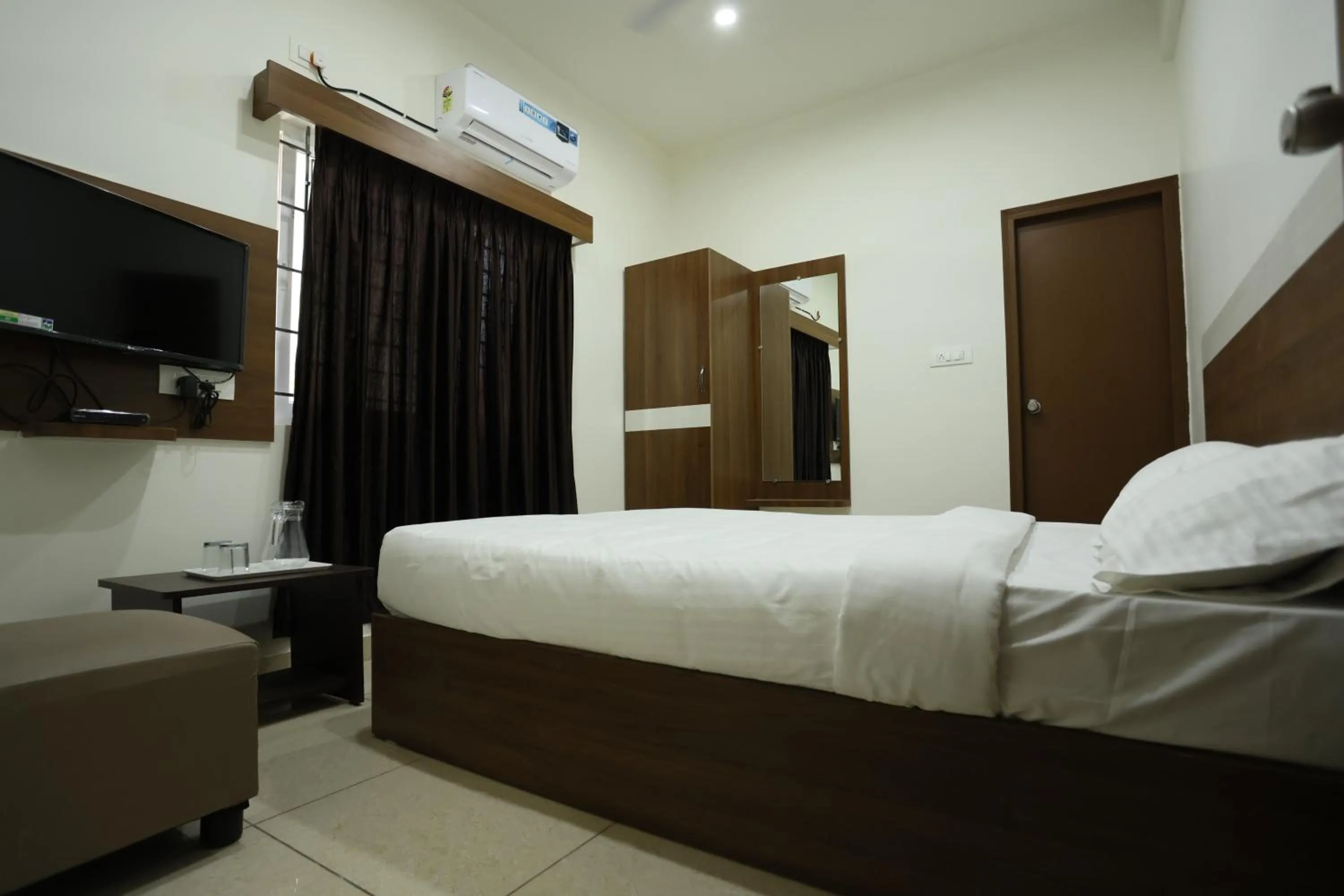 Bed in Hotel Sigma Suites