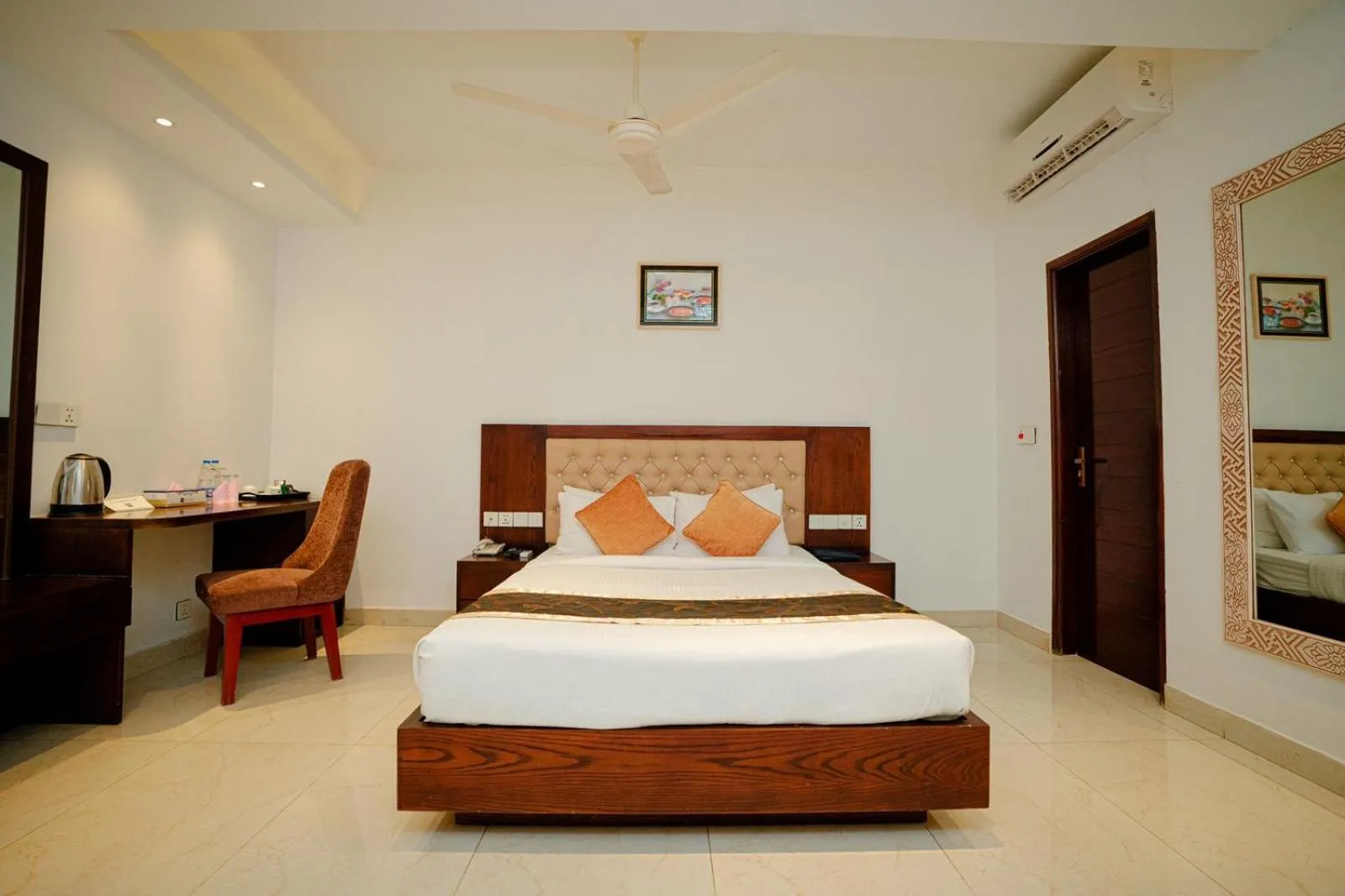 Bed in Royal Raj Hotel