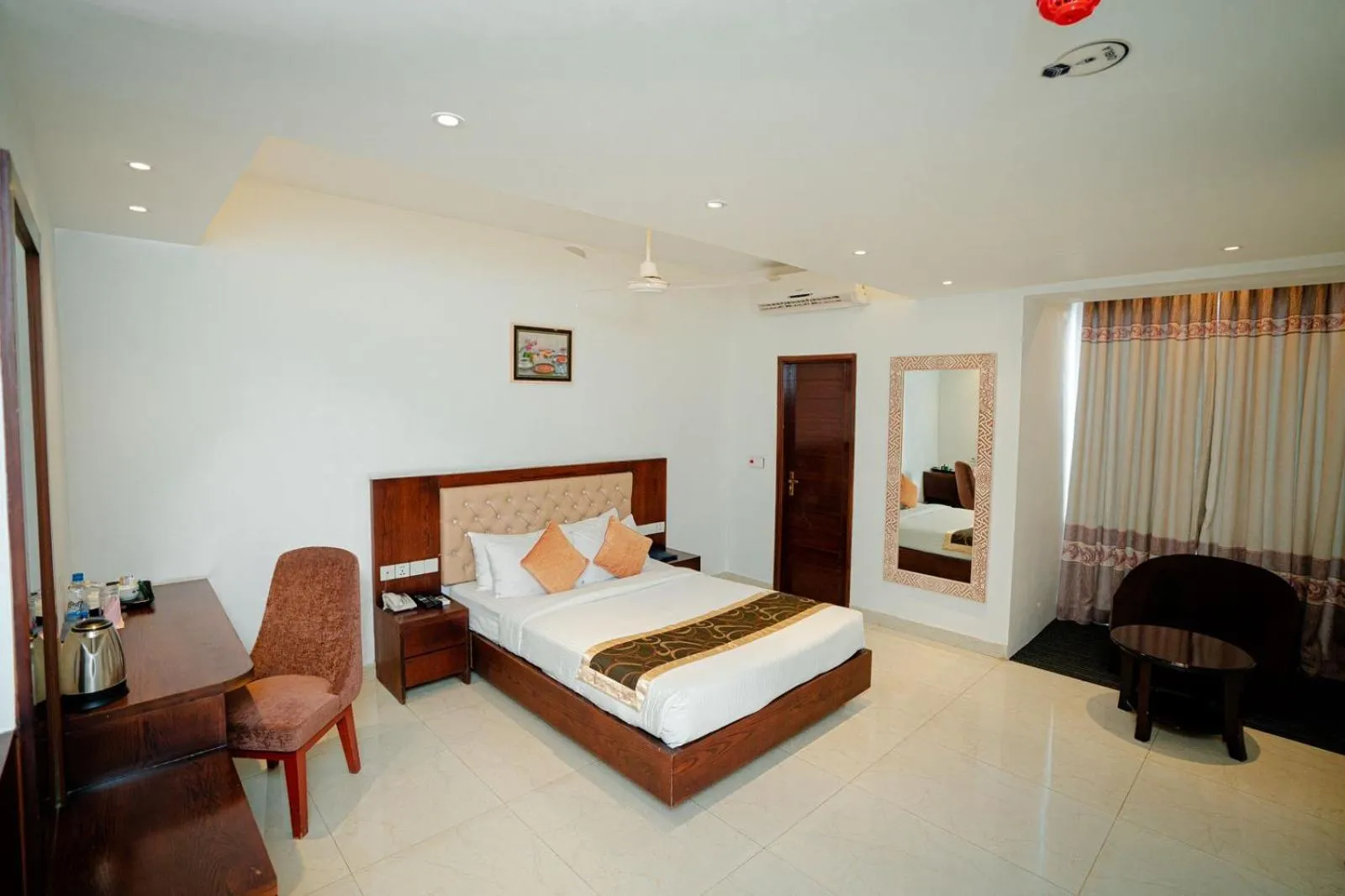 Bed in Royal Raj Hotel