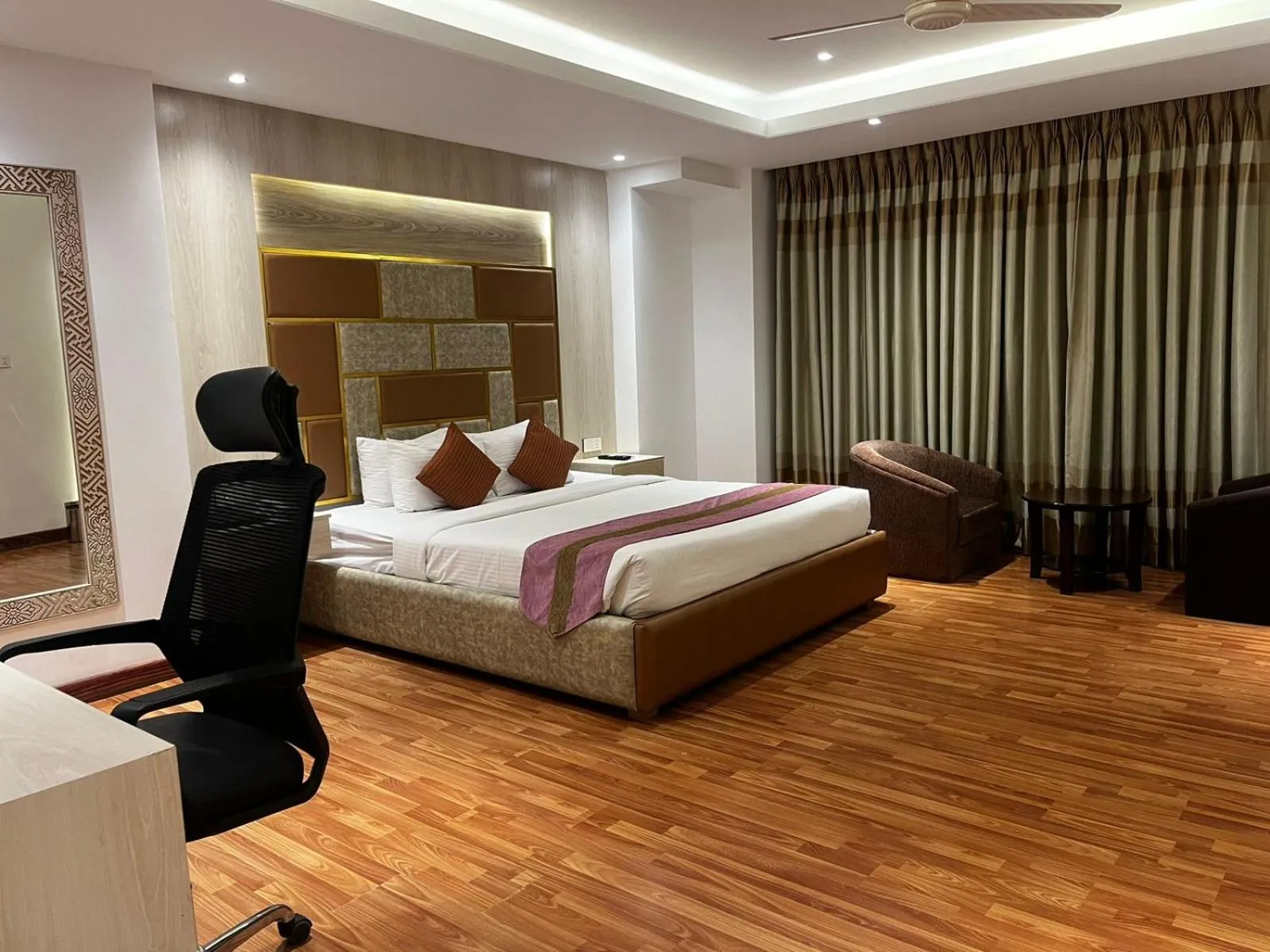 Bed in Royal Raj Hotel