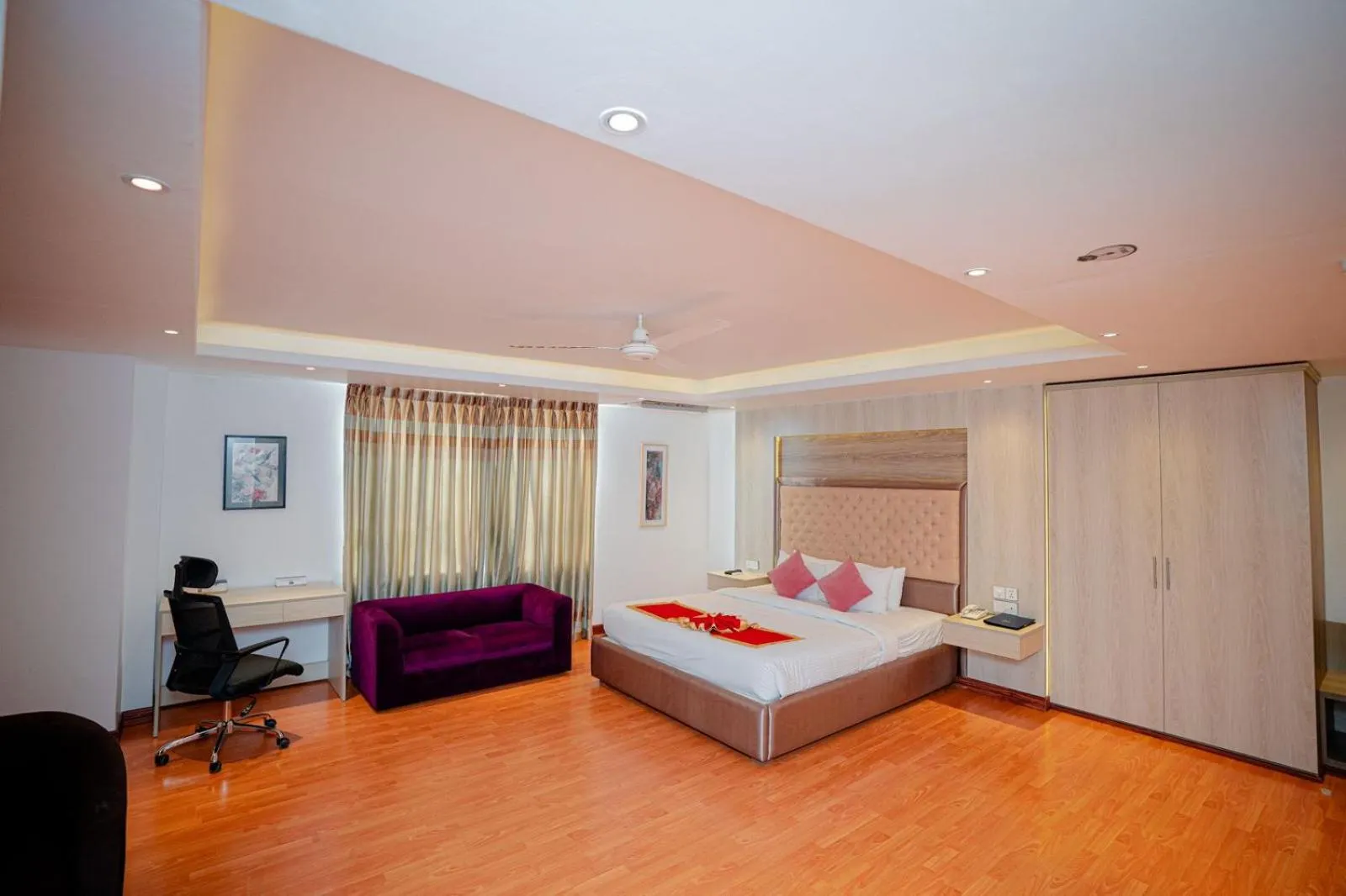 Bed in Royal Raj Hotel