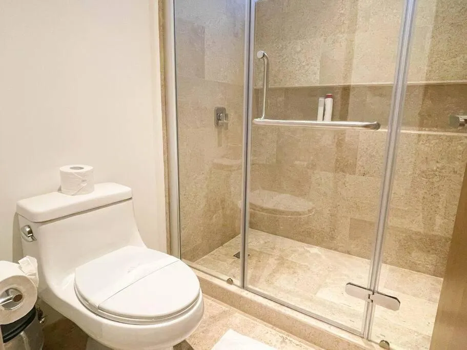 Bathroom in Ipana by Andiani Travel