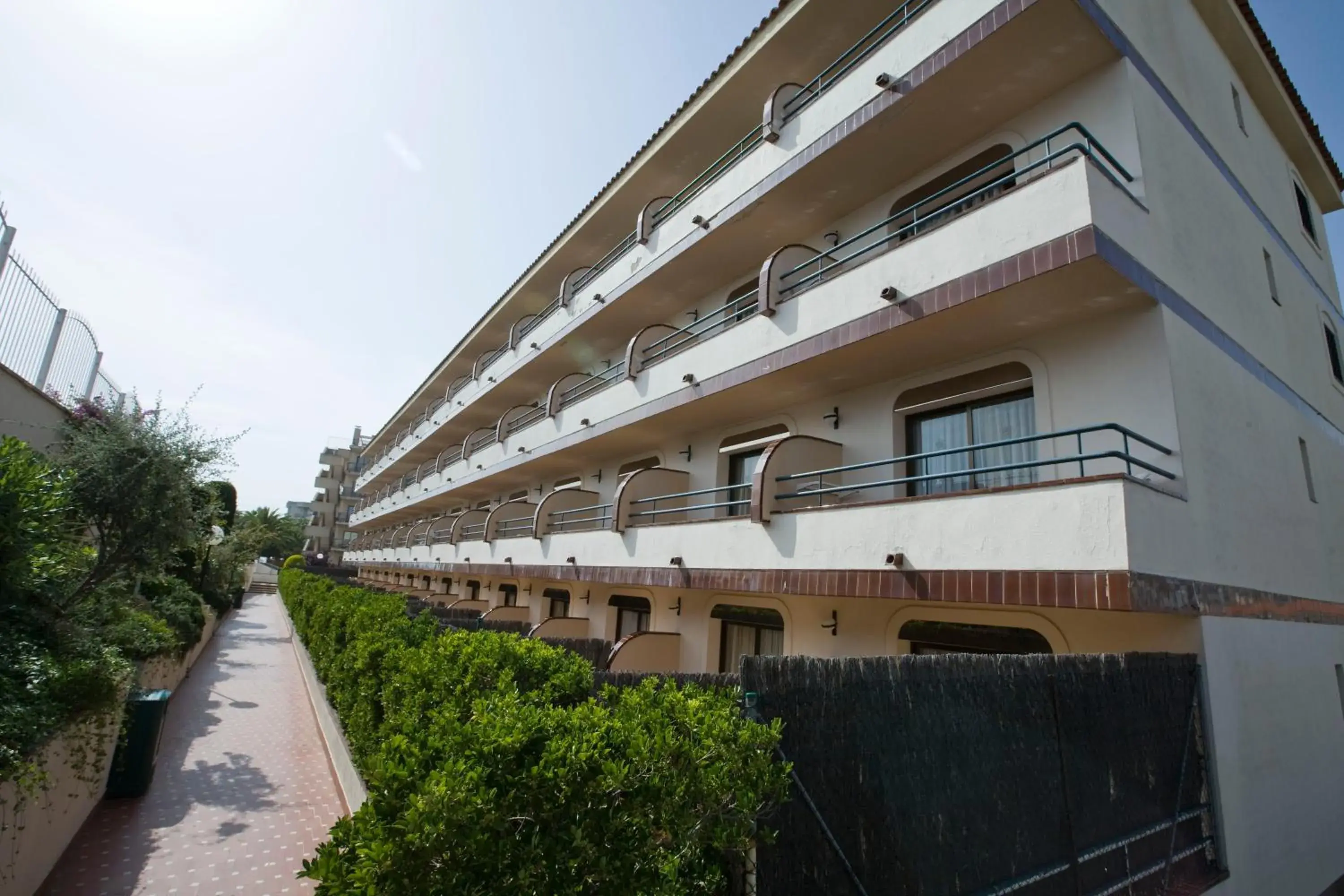 Property building in Apartamentos Guitart Property building in Apartamentos Guitart