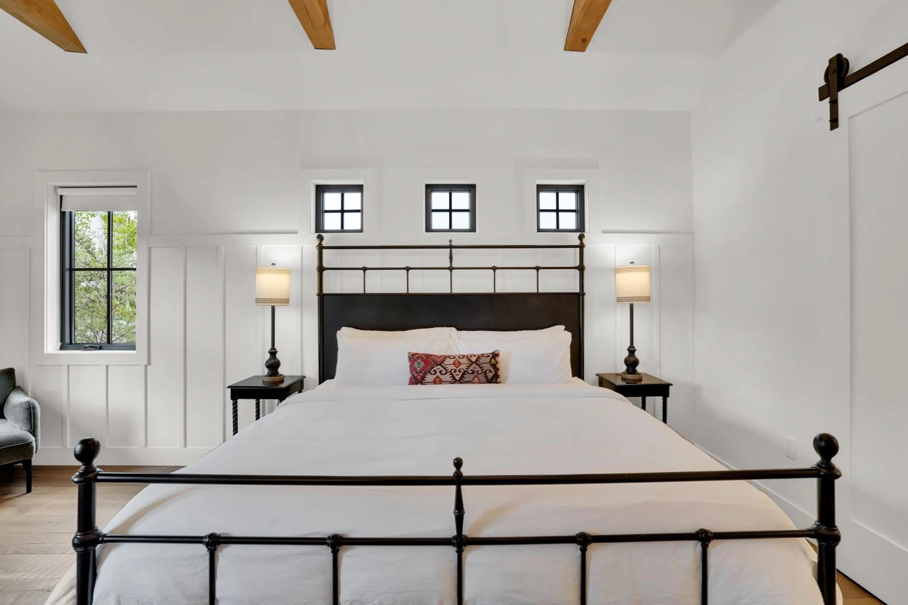 Bed in The Scout Boutique Cottages