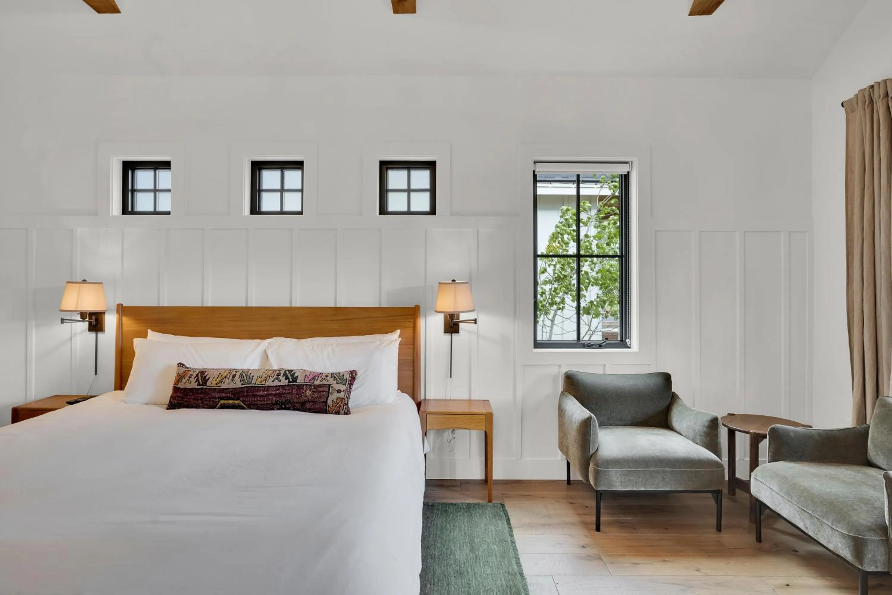 Bed in The Scout Boutique Cottages