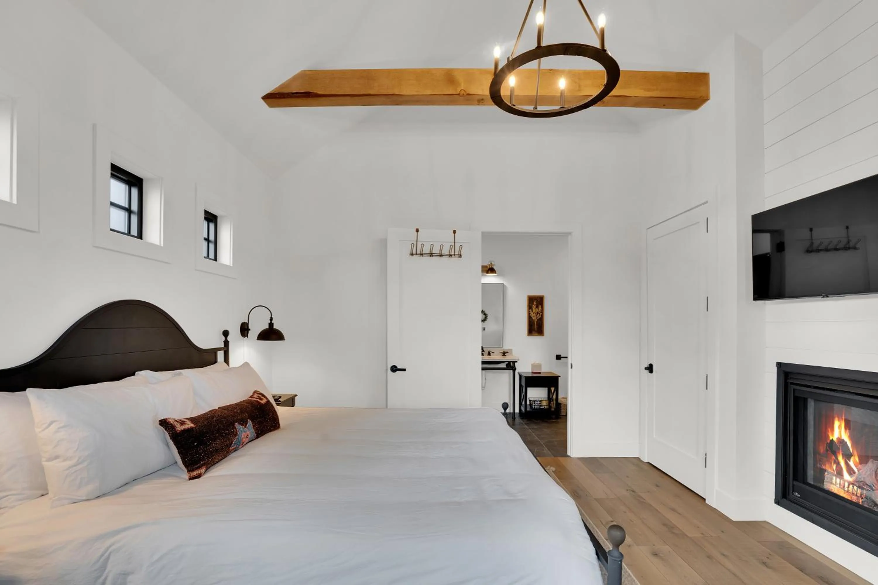 Bed in The Scout Boutique Cottages