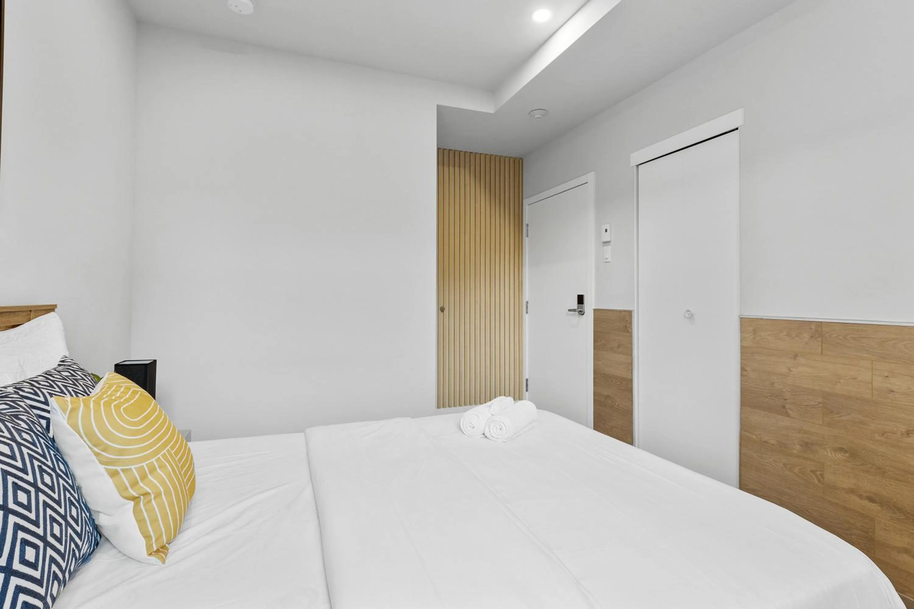 Bed in Le Sand & Stone Hotel