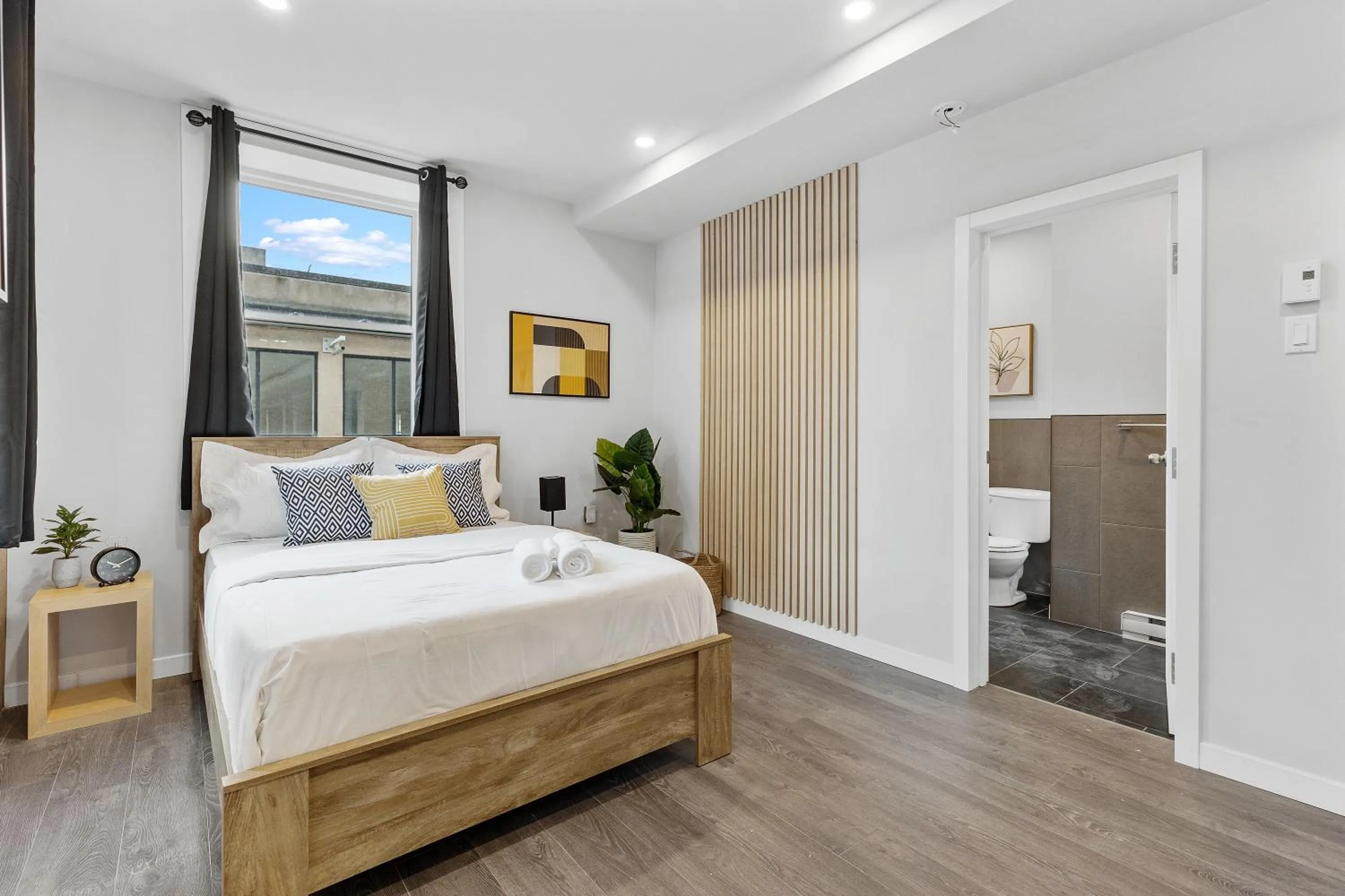 Bed in Le Sand & Stone Hotel