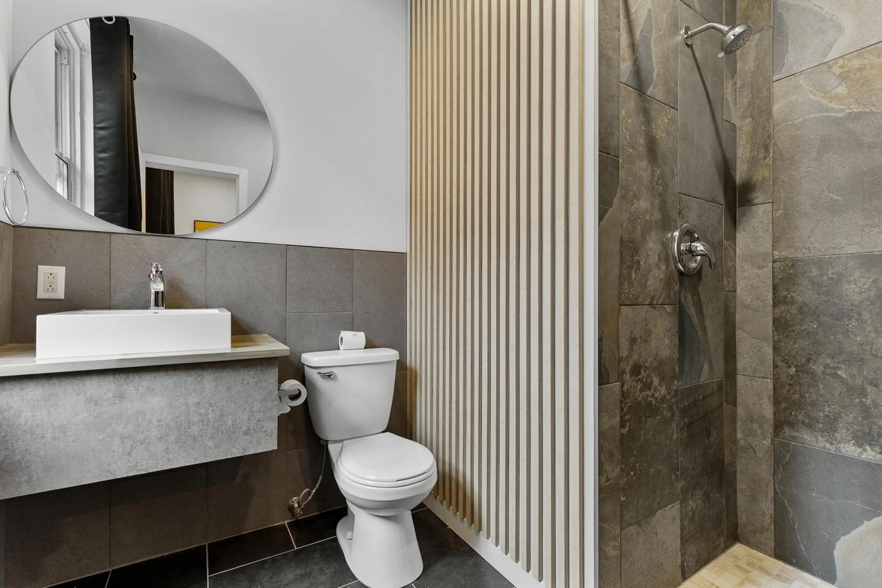 Bathroom in Le Sand & Stone Hotel