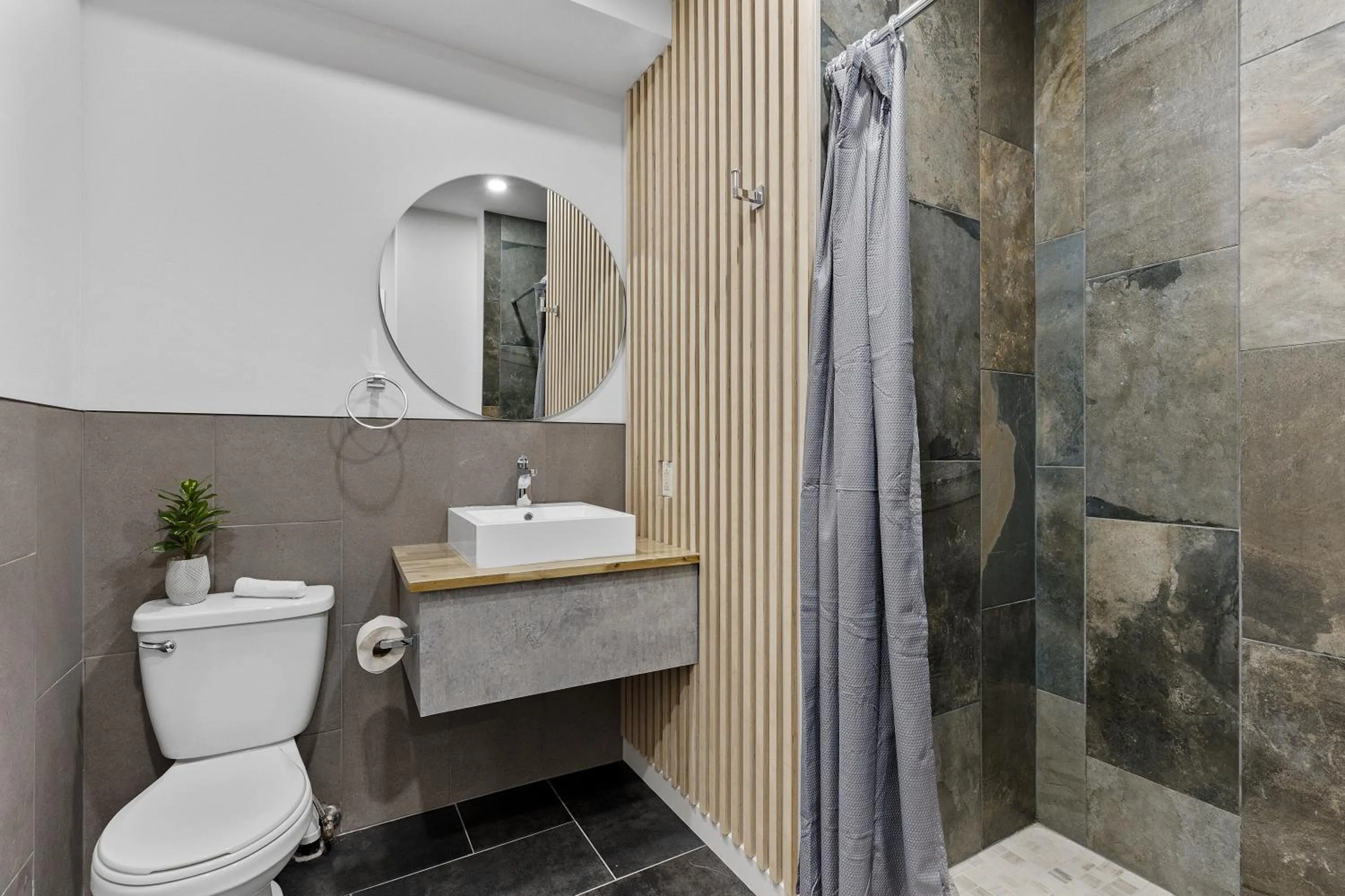 Bathroom in Le Sand & Stone Hotel