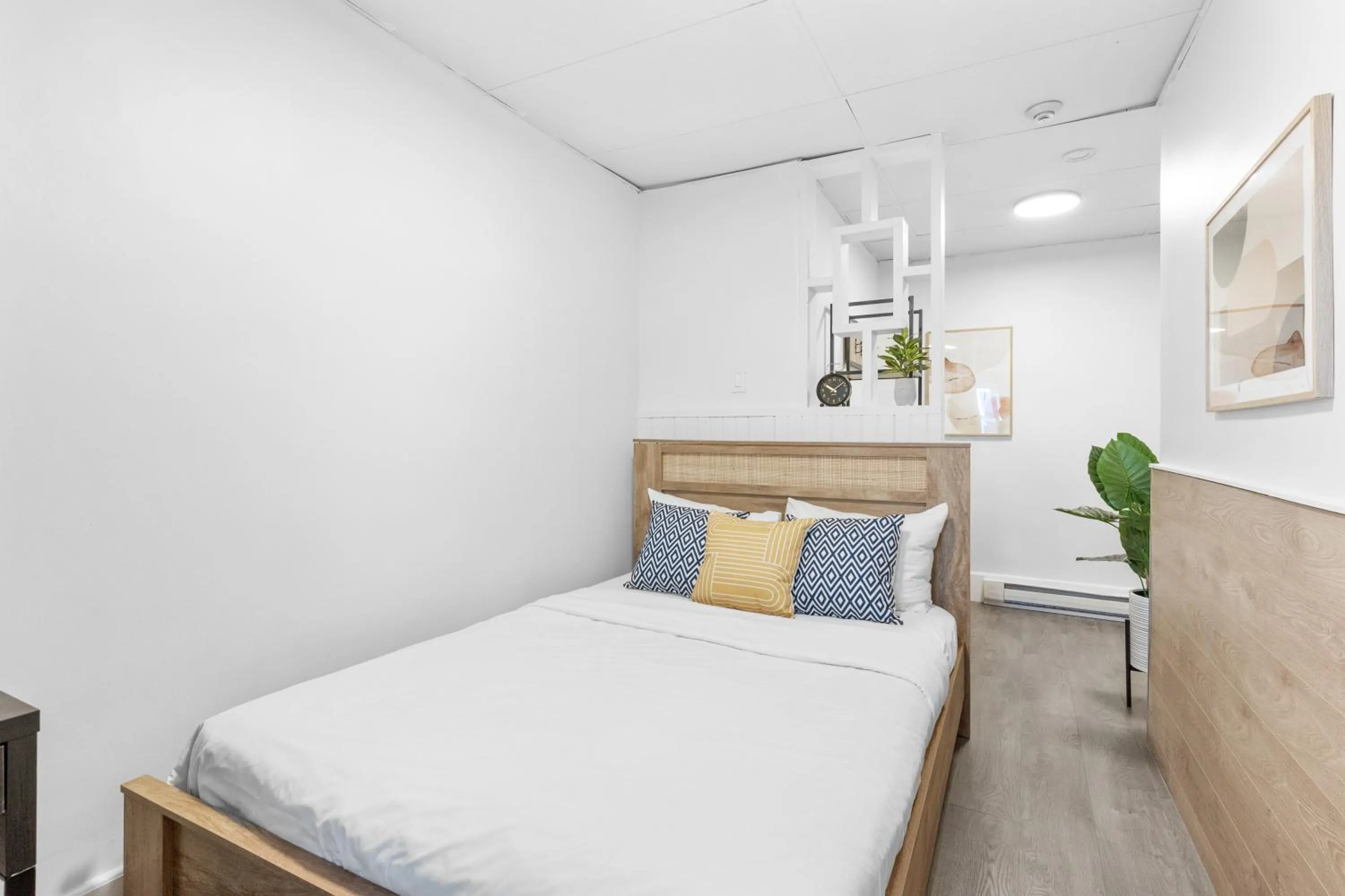 Bed in Le Sand & Stone Hotel