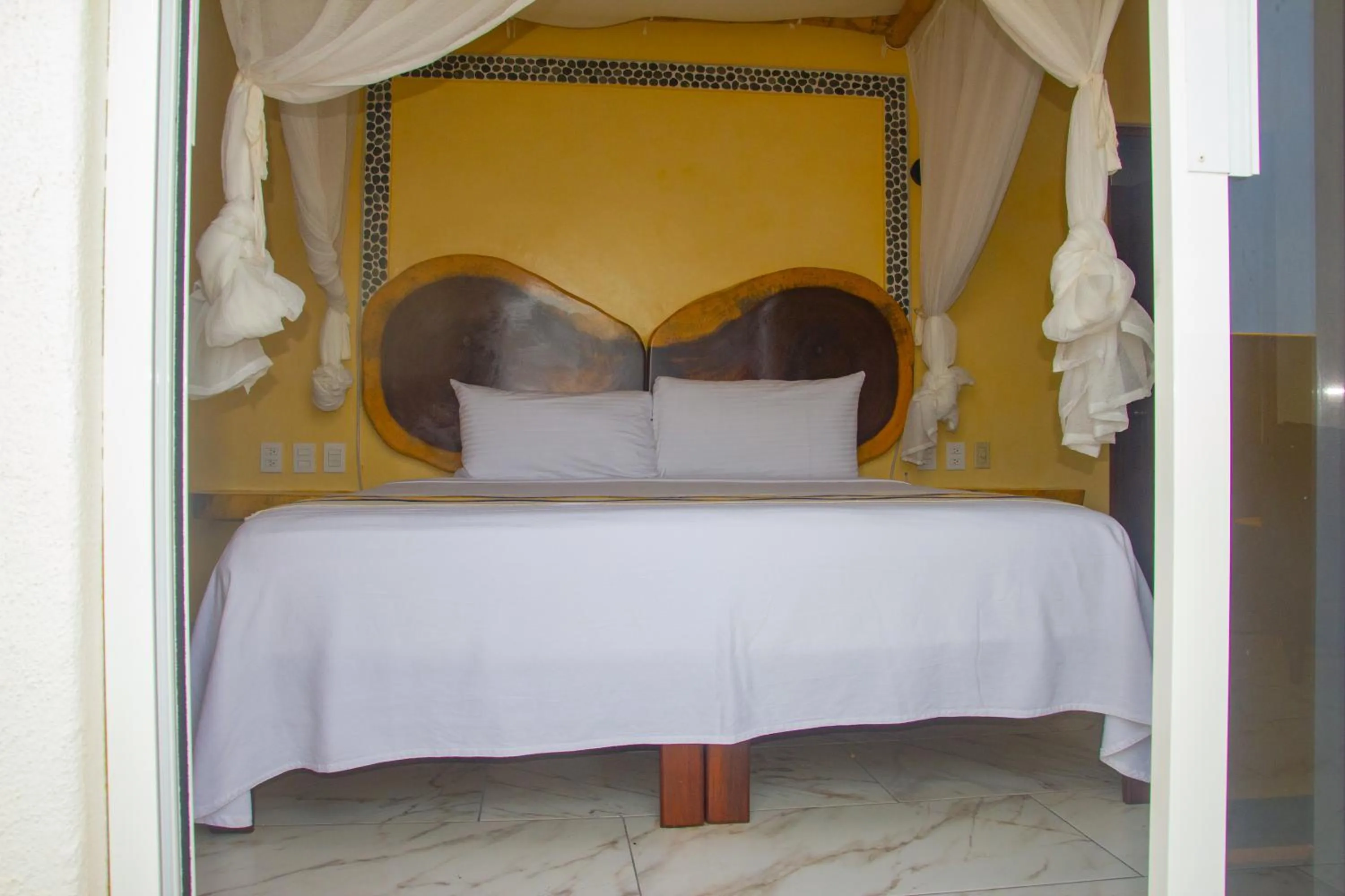 Bed in Hotel Happy Beach