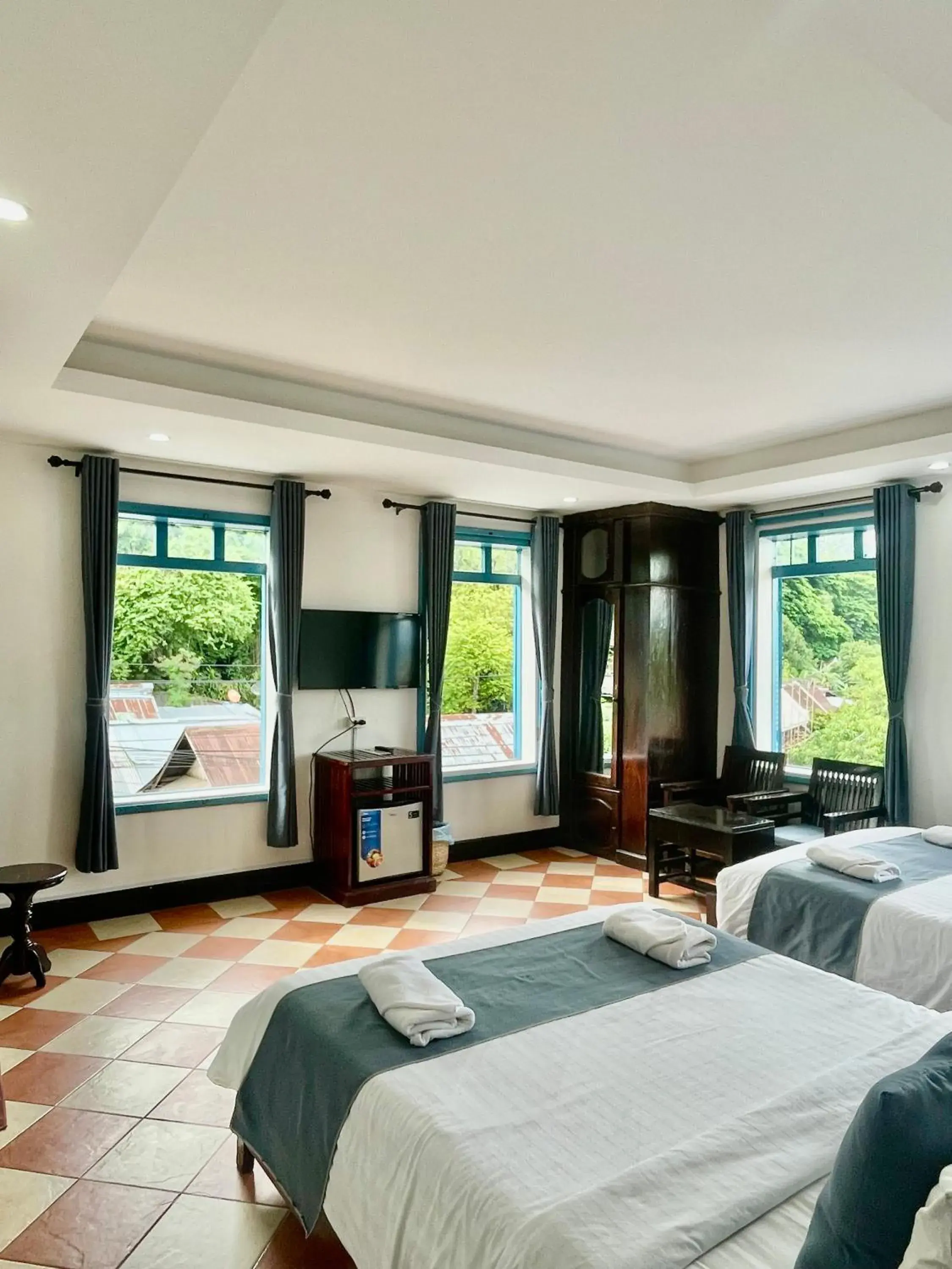 Quadruple Room with Mountain View in Villa Merry Lao Ban Aphay Quadruple Room with Mountain View in Villa Merry Lao Ban Aphay