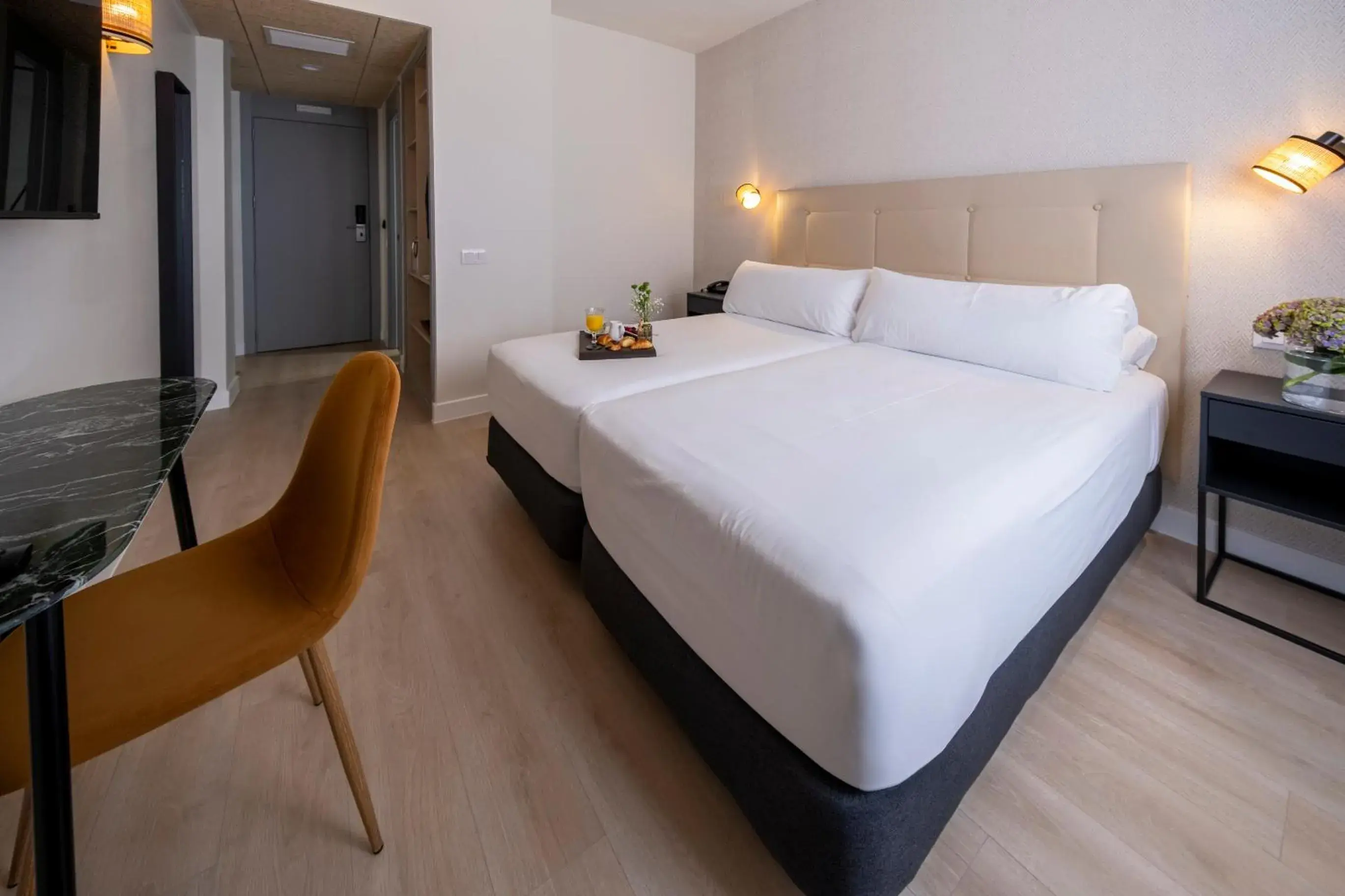 Bed in Hotel Cisneros Bed in Hotel Cisneros