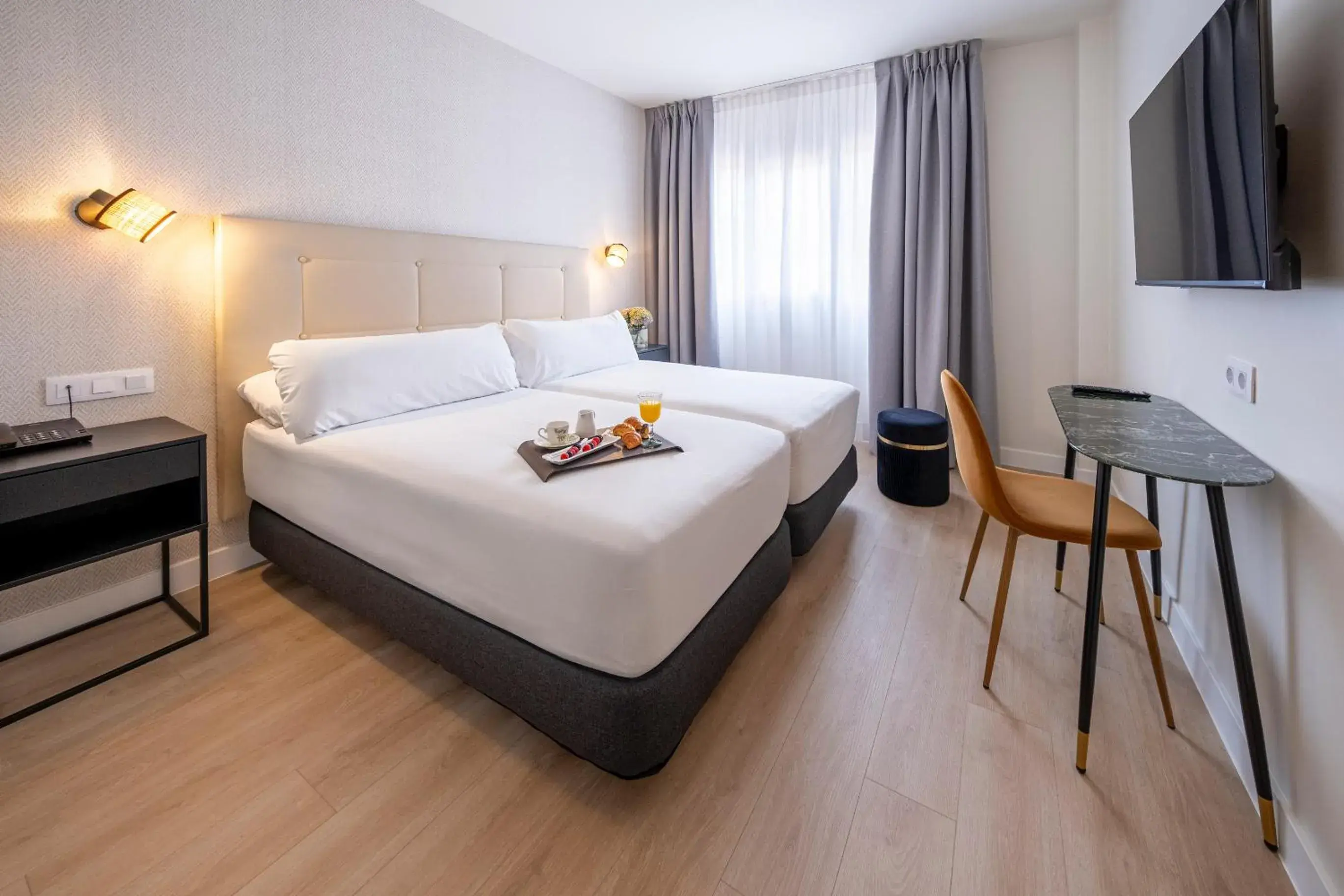 Bed in Hotel Cisneros Bed in Hotel Cisneros