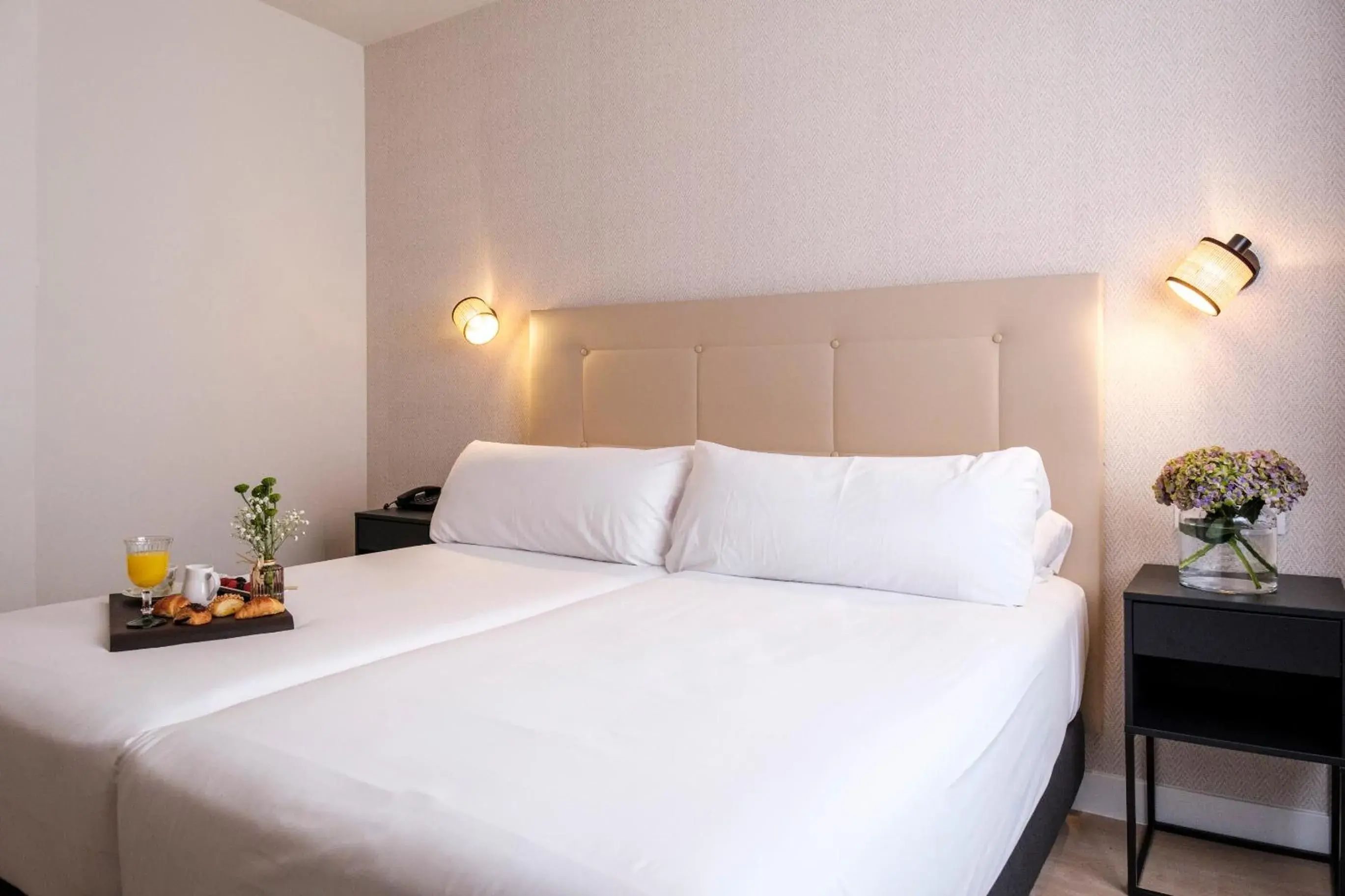 Bed in Hotel Cisneros Bed in Hotel Cisneros