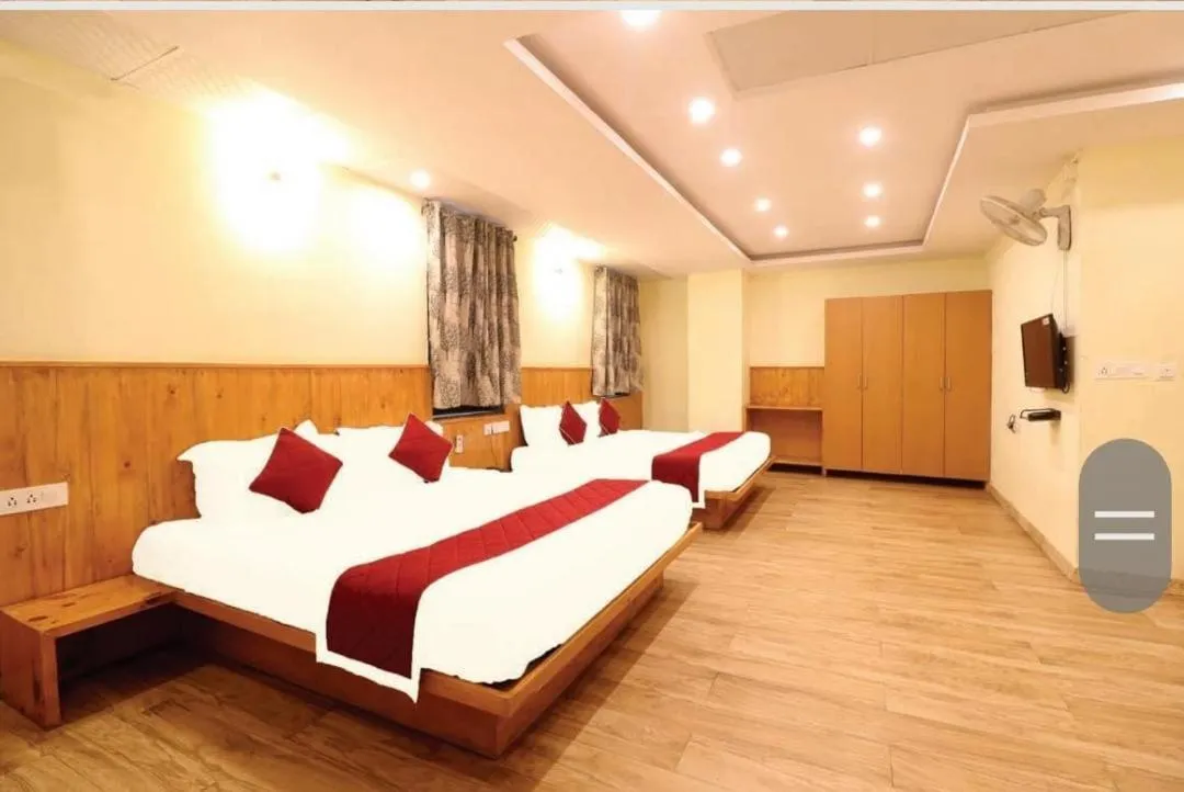 Bed in Hotel Royal Orbit