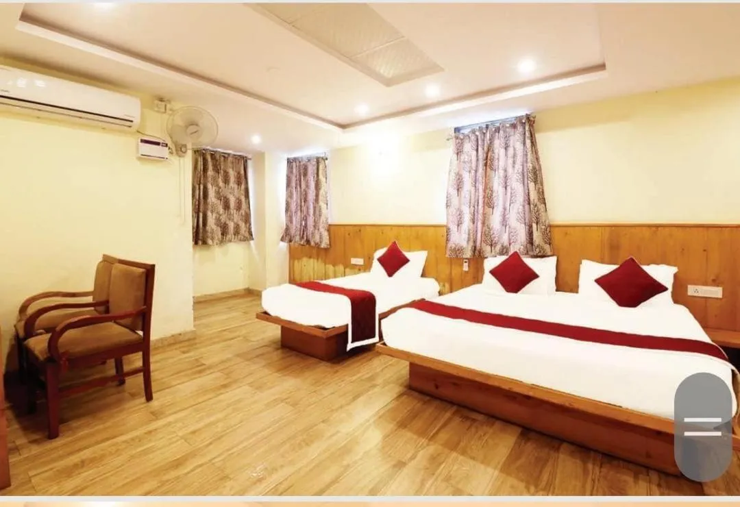 Bed in Hotel Royal Orbit